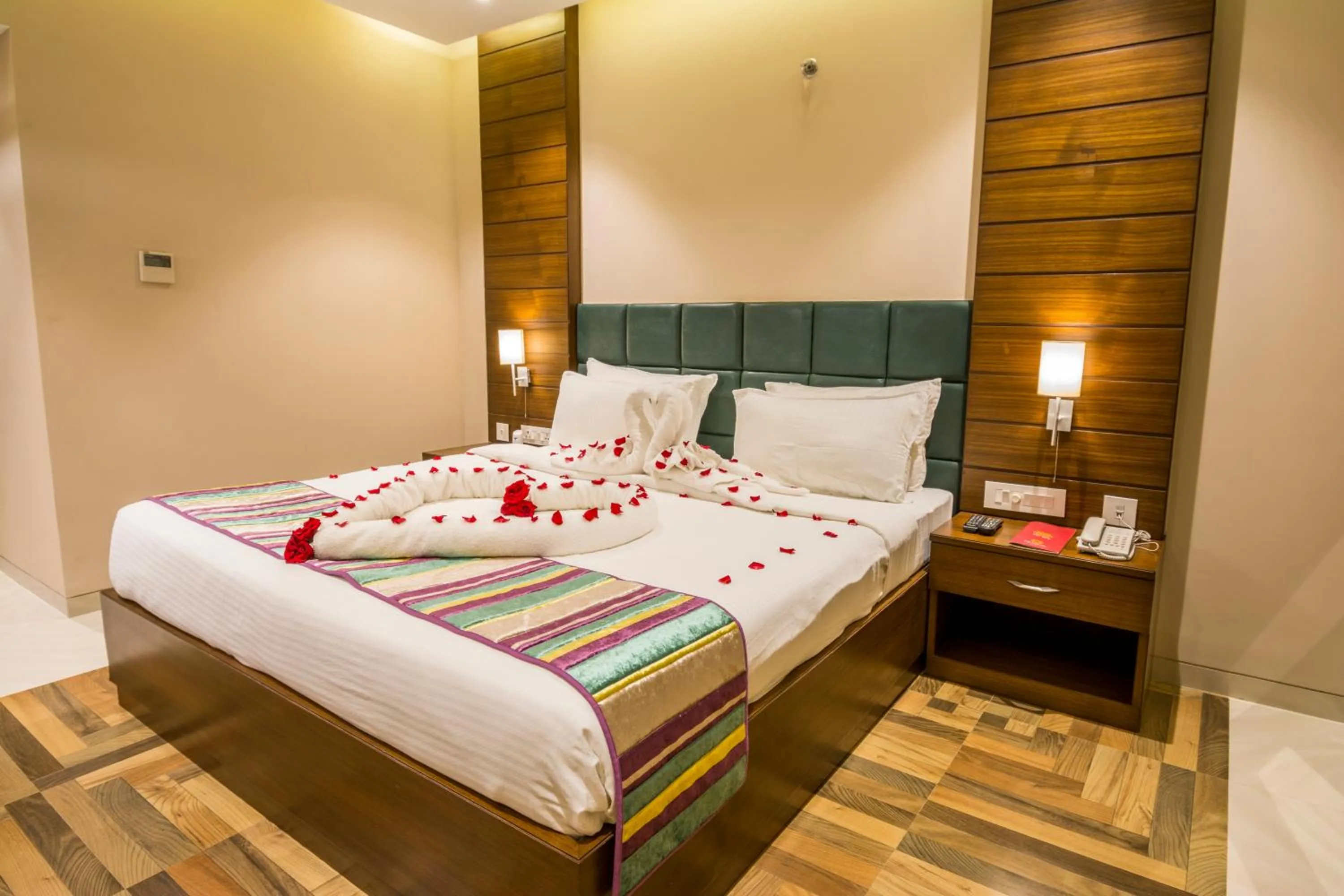 Bedroom, Bed in The Capital Hotel