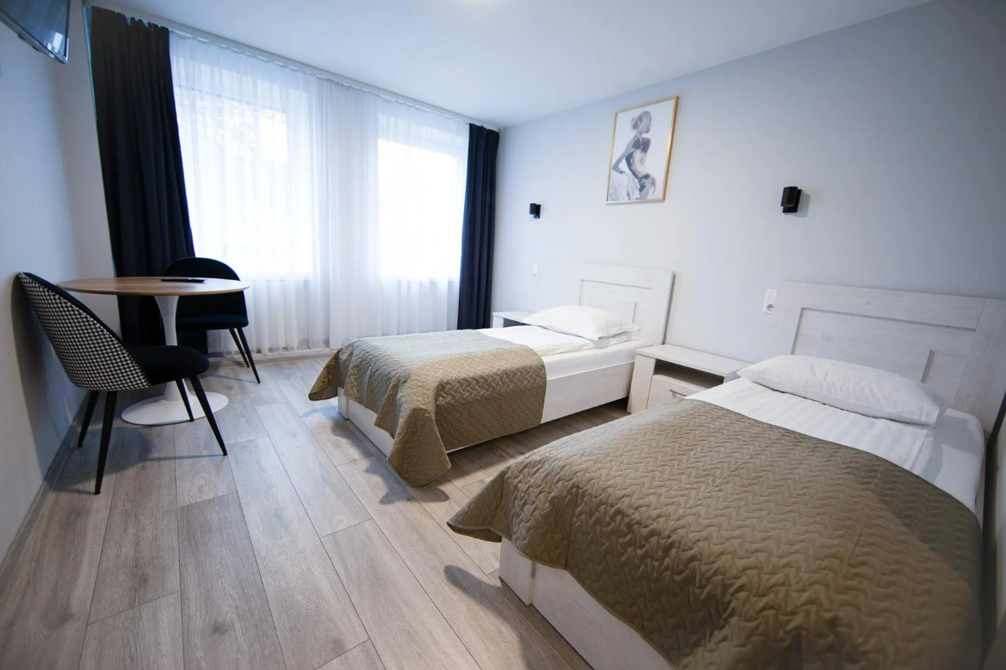 Bed in Dzukija Hotel