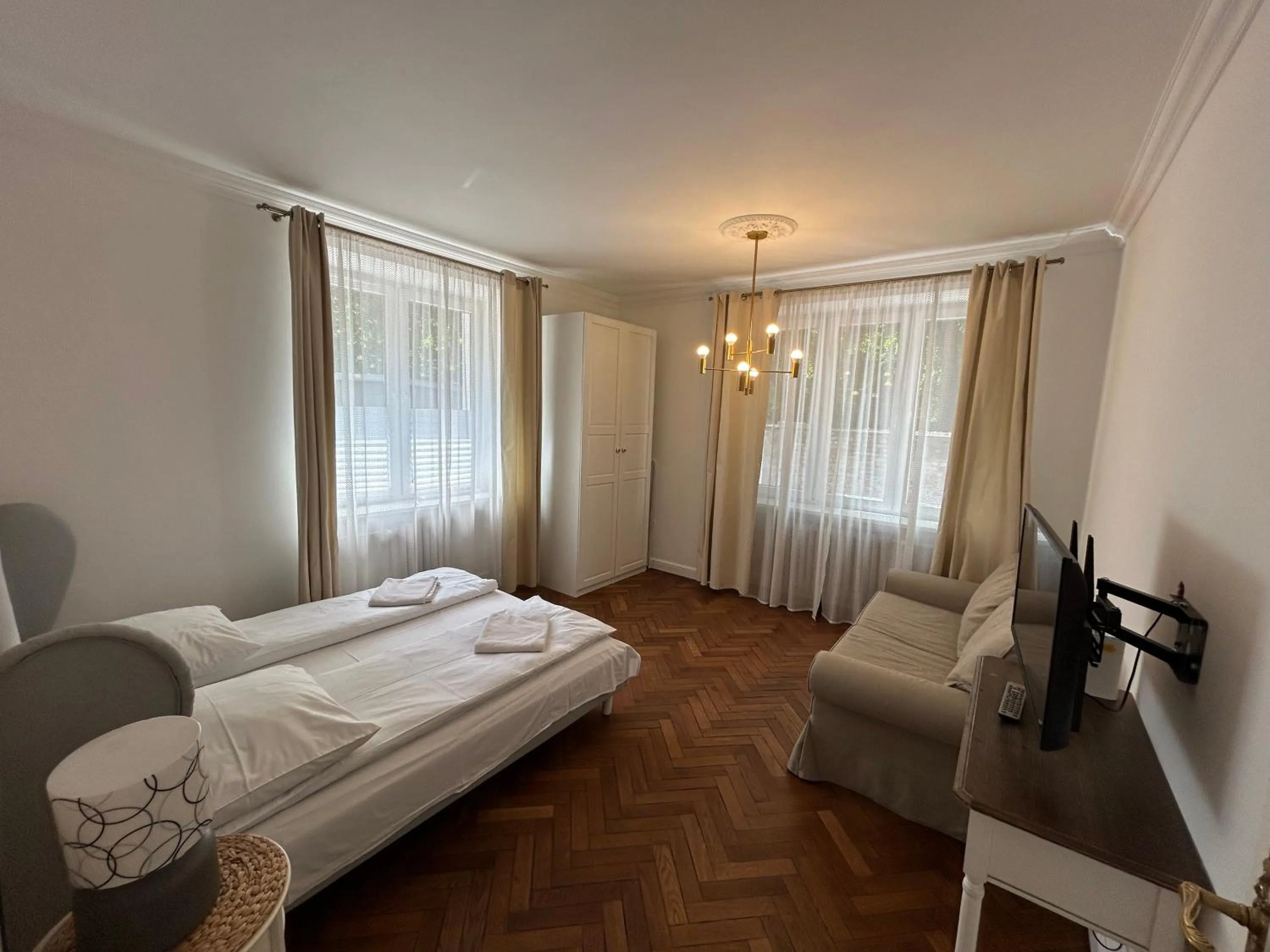 Bed in Cybulskiego Guest Rooms