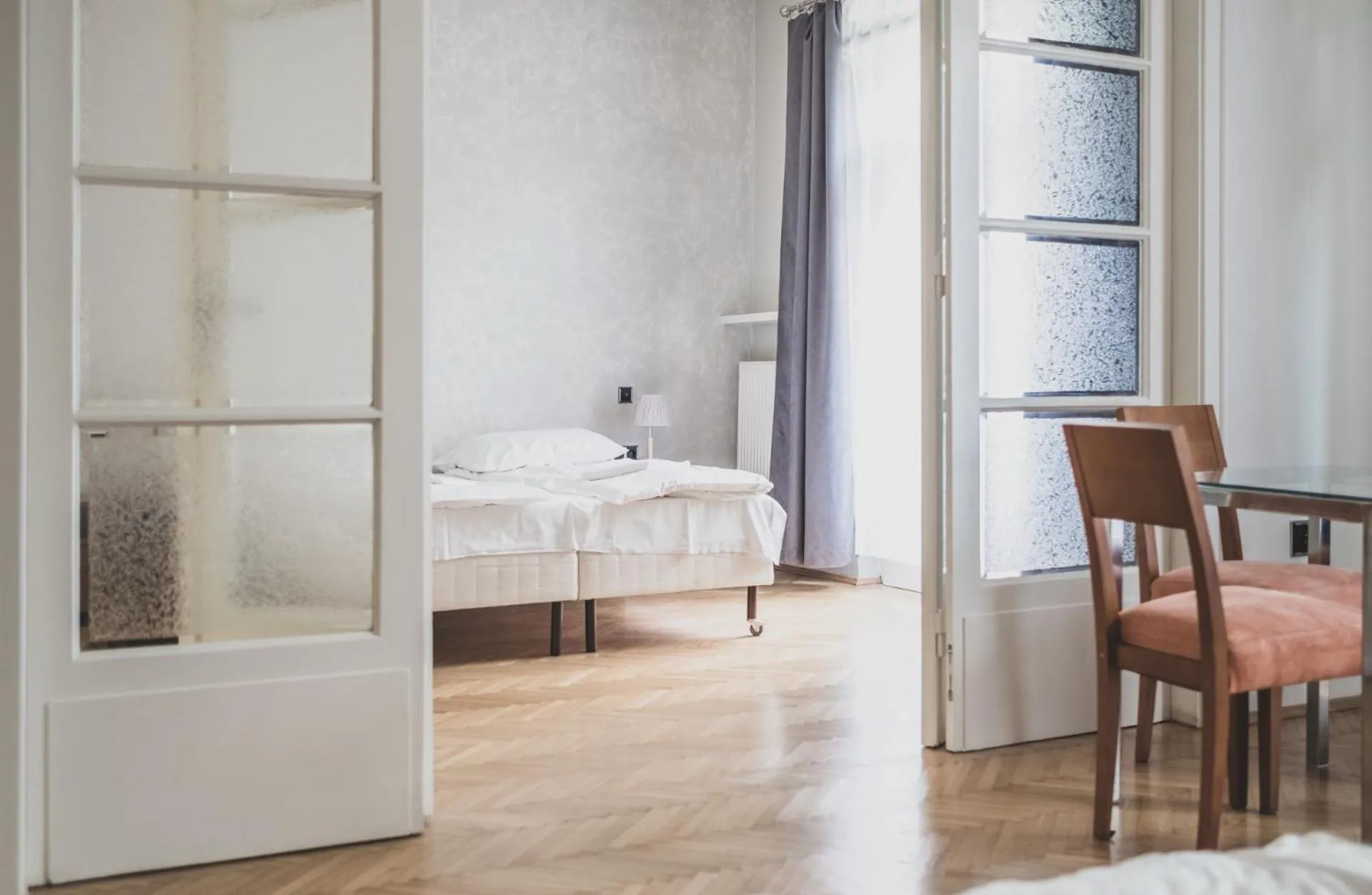 Bed in Cybulskiego Guest Rooms