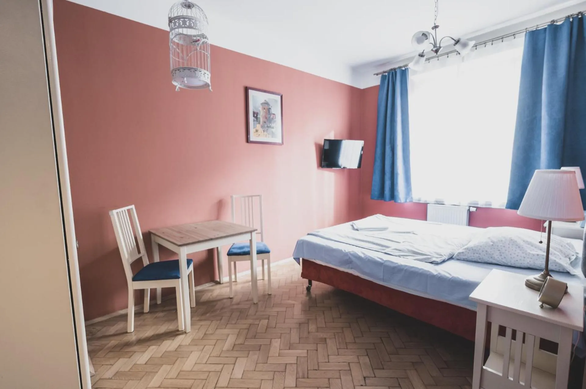 Bed in Cybulskiego Guest Rooms