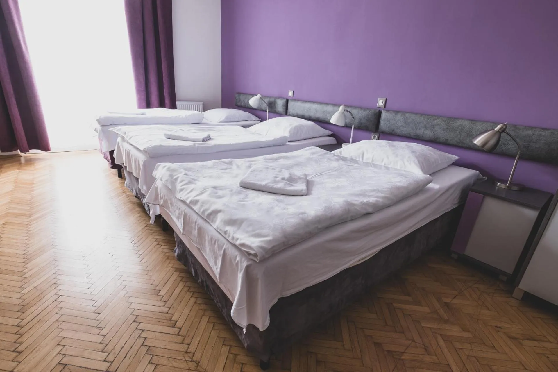 Bed in Cybulskiego Guest Rooms