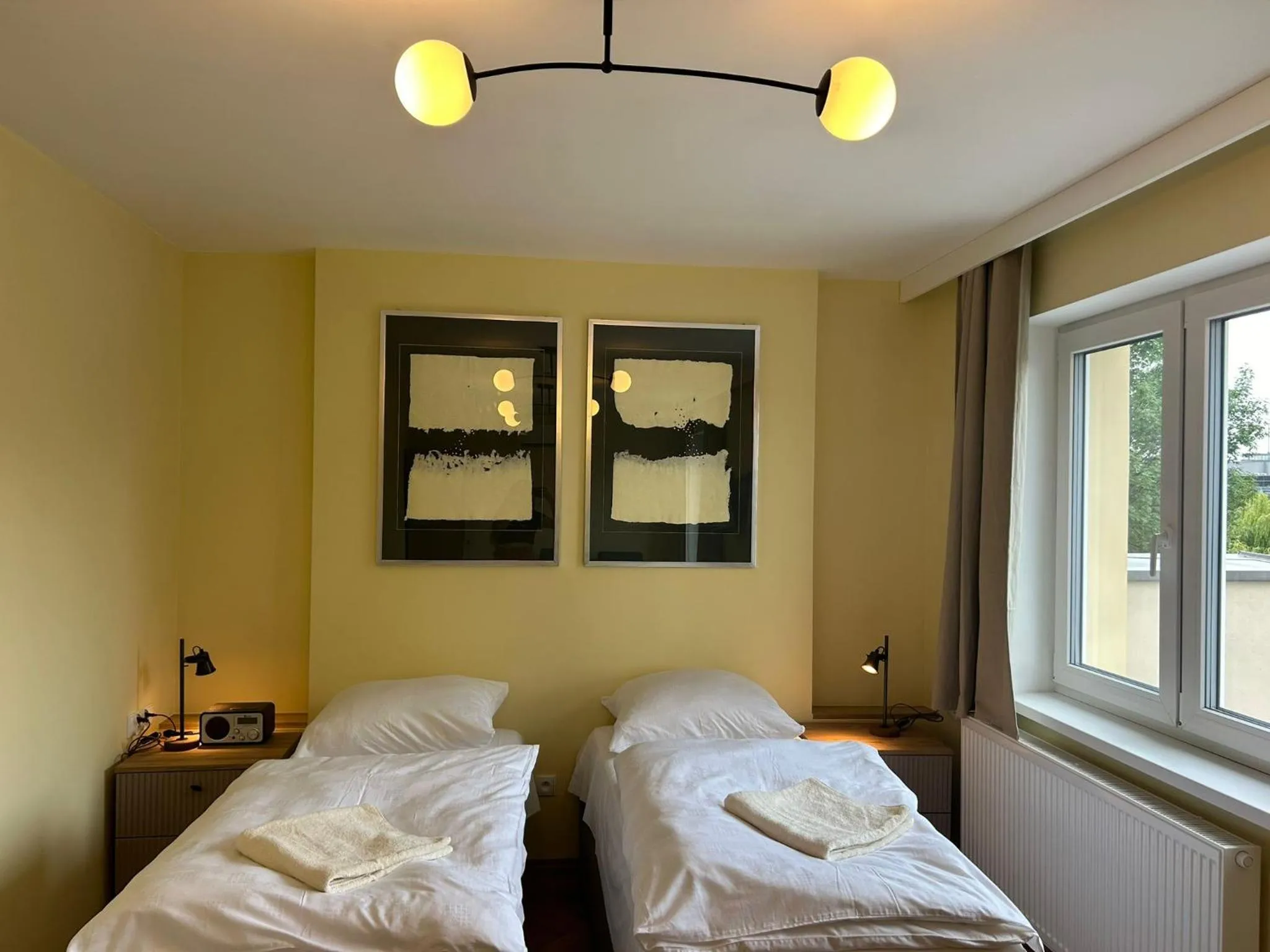 Bed in Cybulskiego Guest Rooms