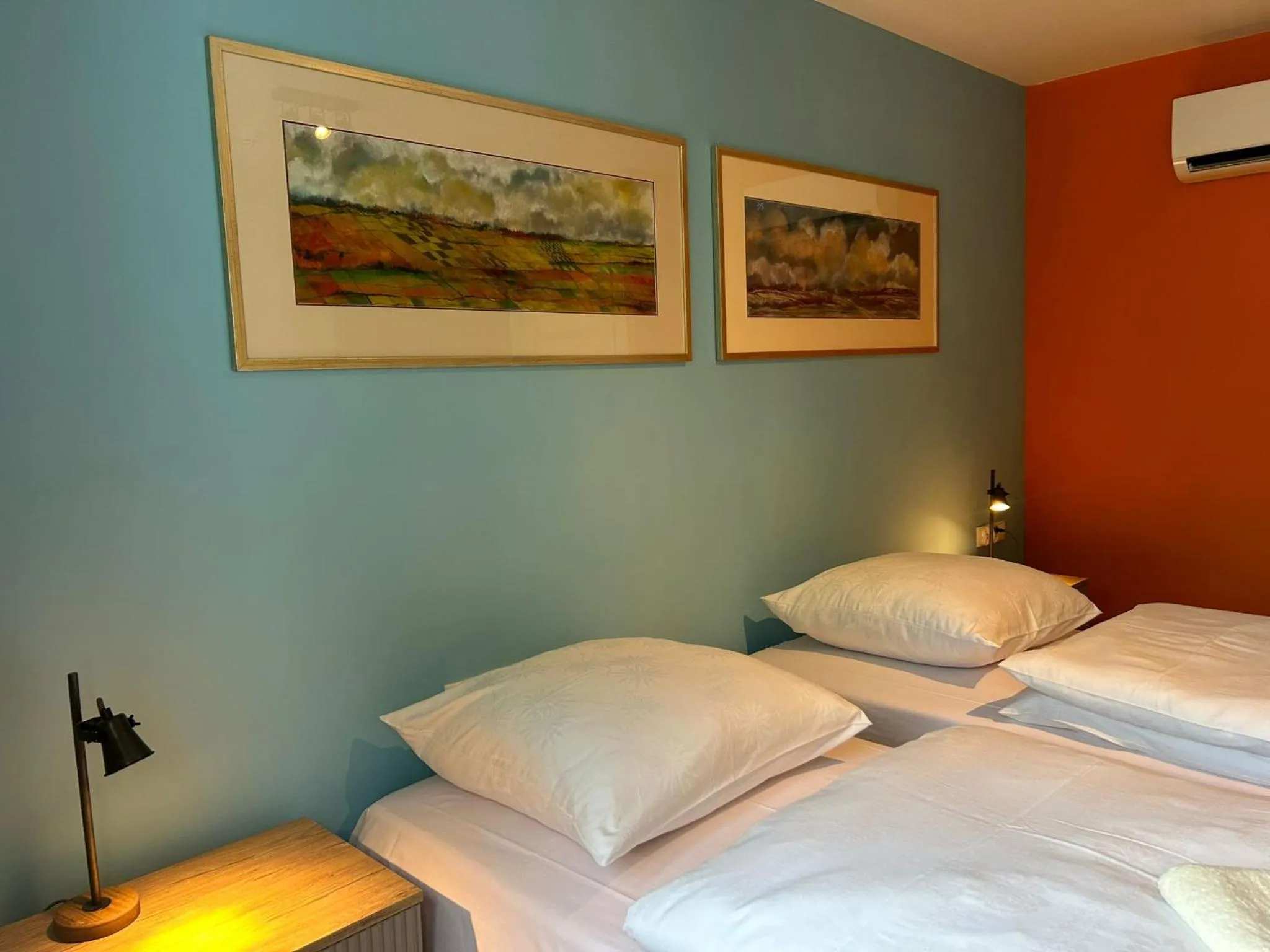 Bed in Cybulskiego Guest Rooms