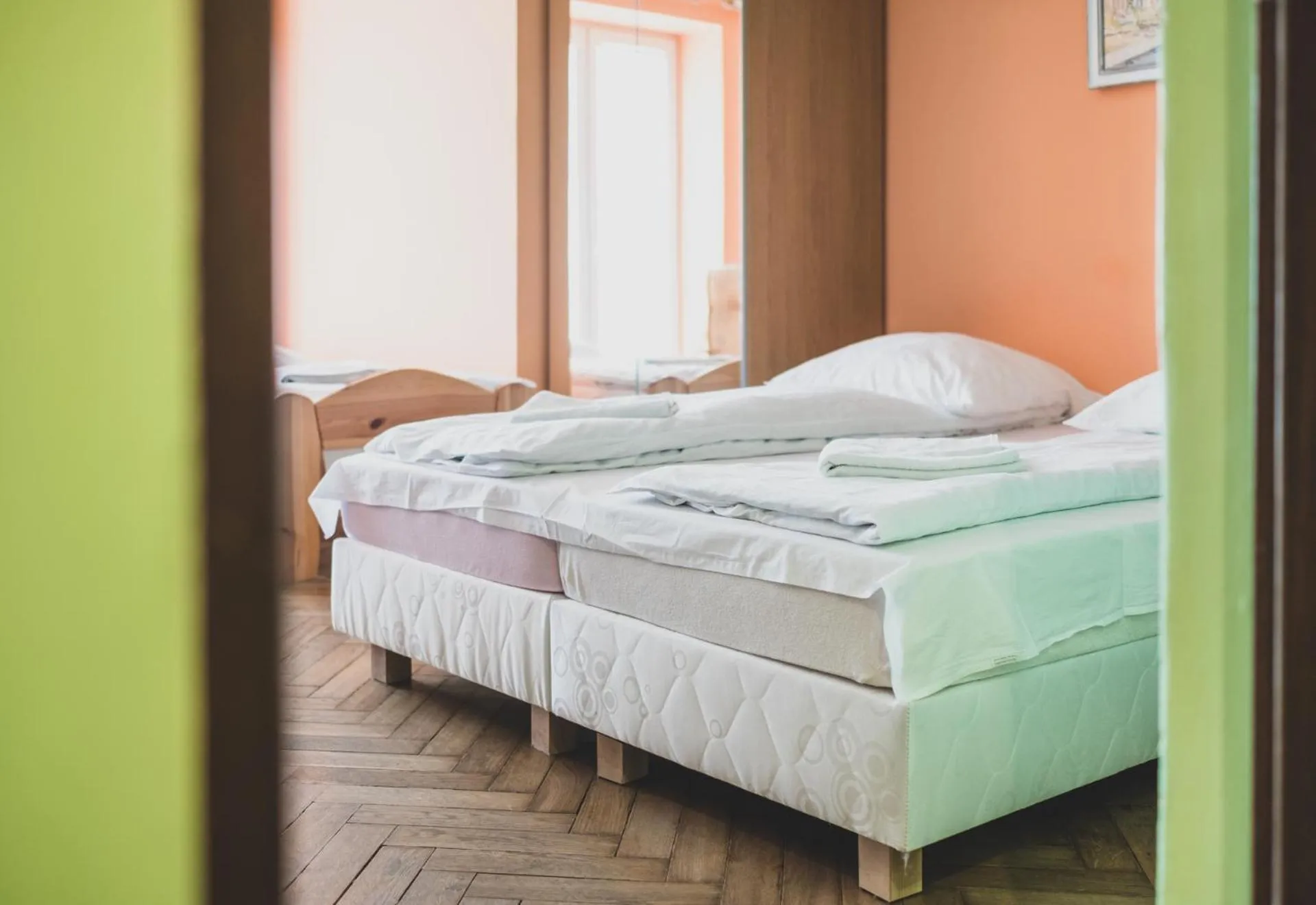 Bed in Cybulskiego Guest Rooms