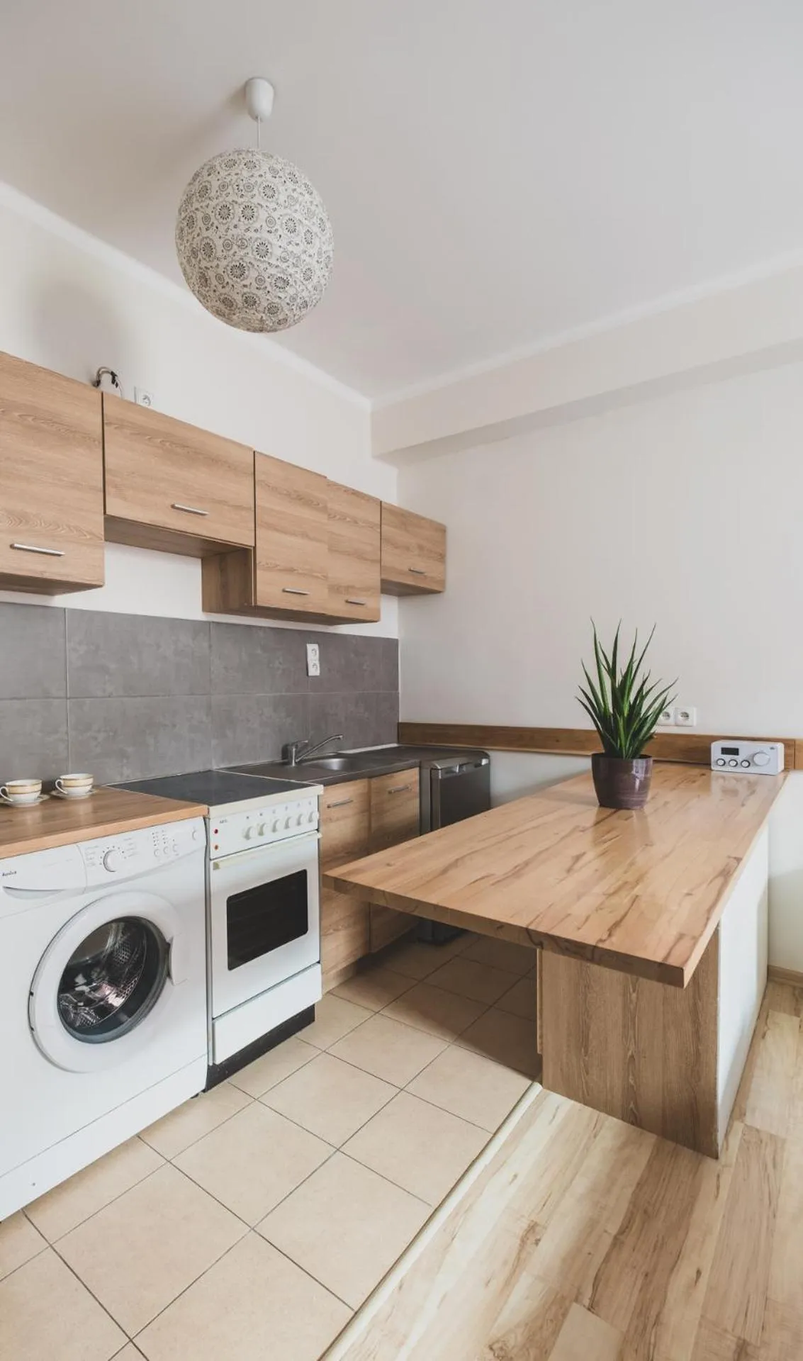 Kitchen or kitchenette in Cybulskiego Guest Rooms