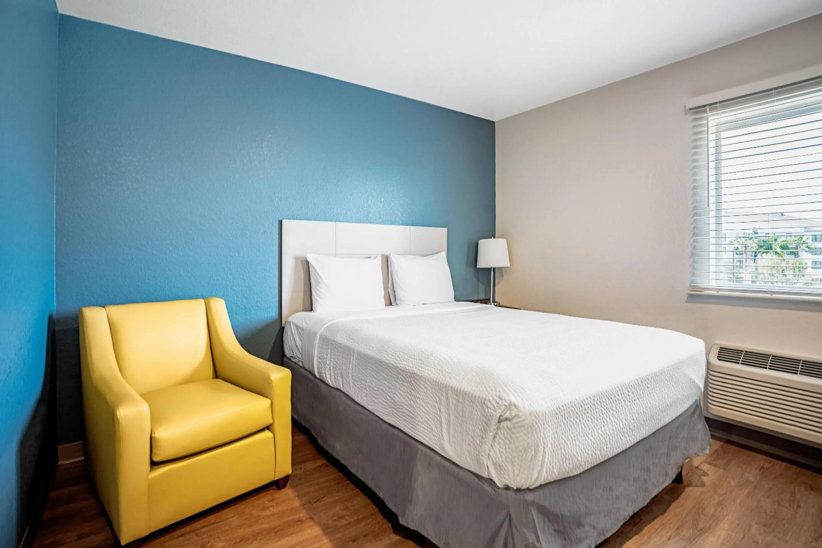 Bedroom, Bed in WoodSpring Suites Naples