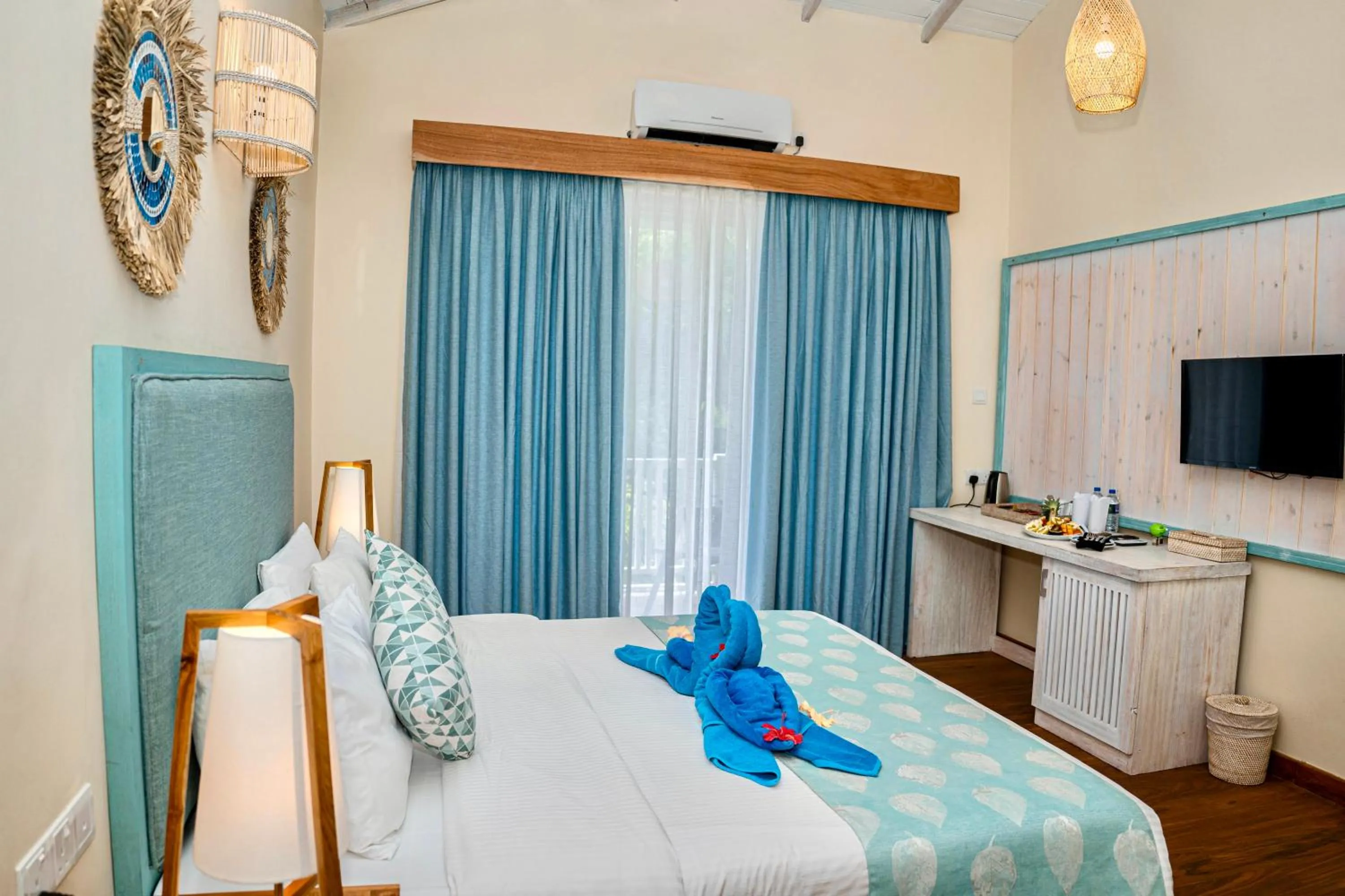 Bed in Thaproban Beach House