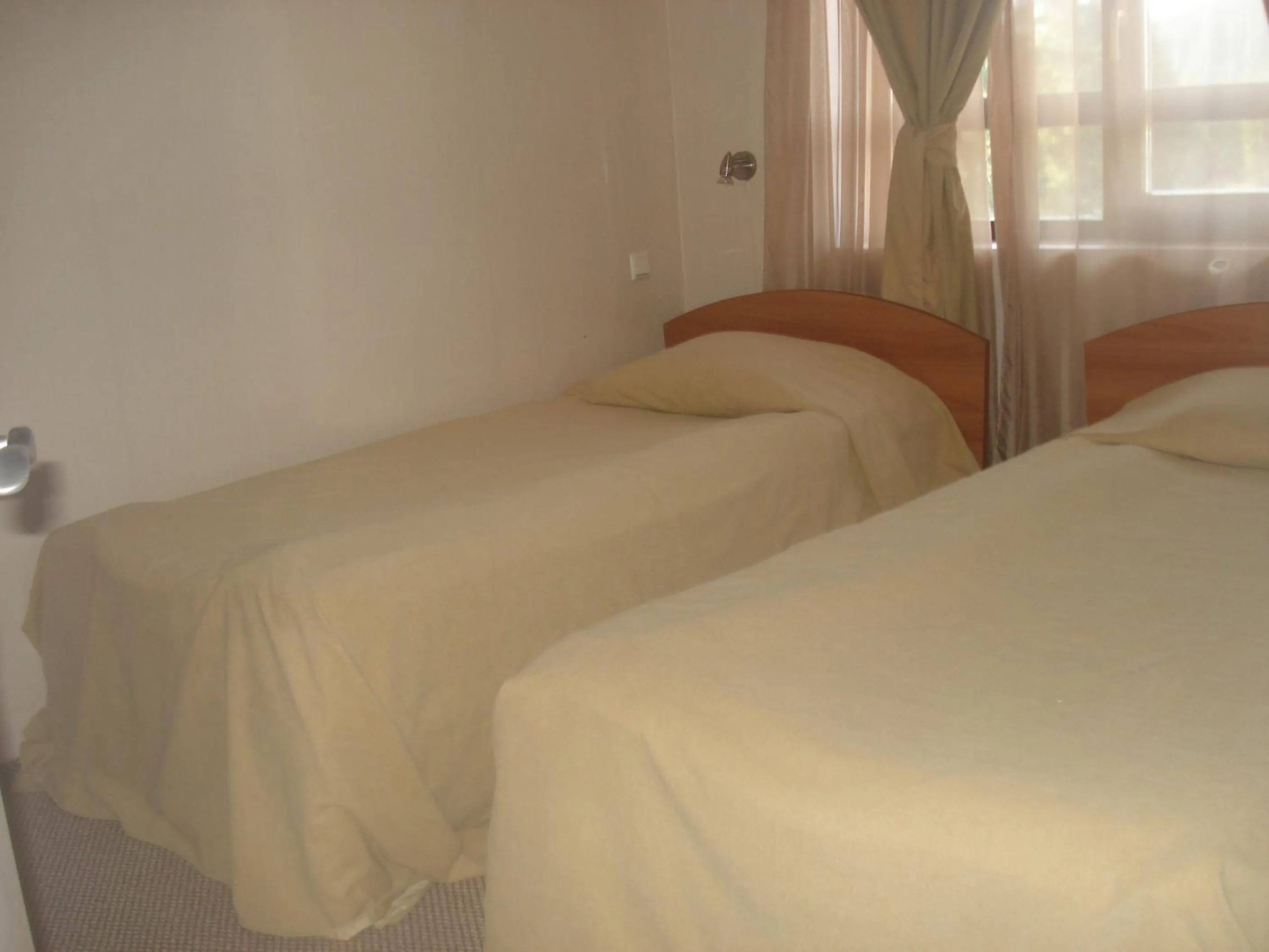 Bed in Snezhanka Apartments TMF