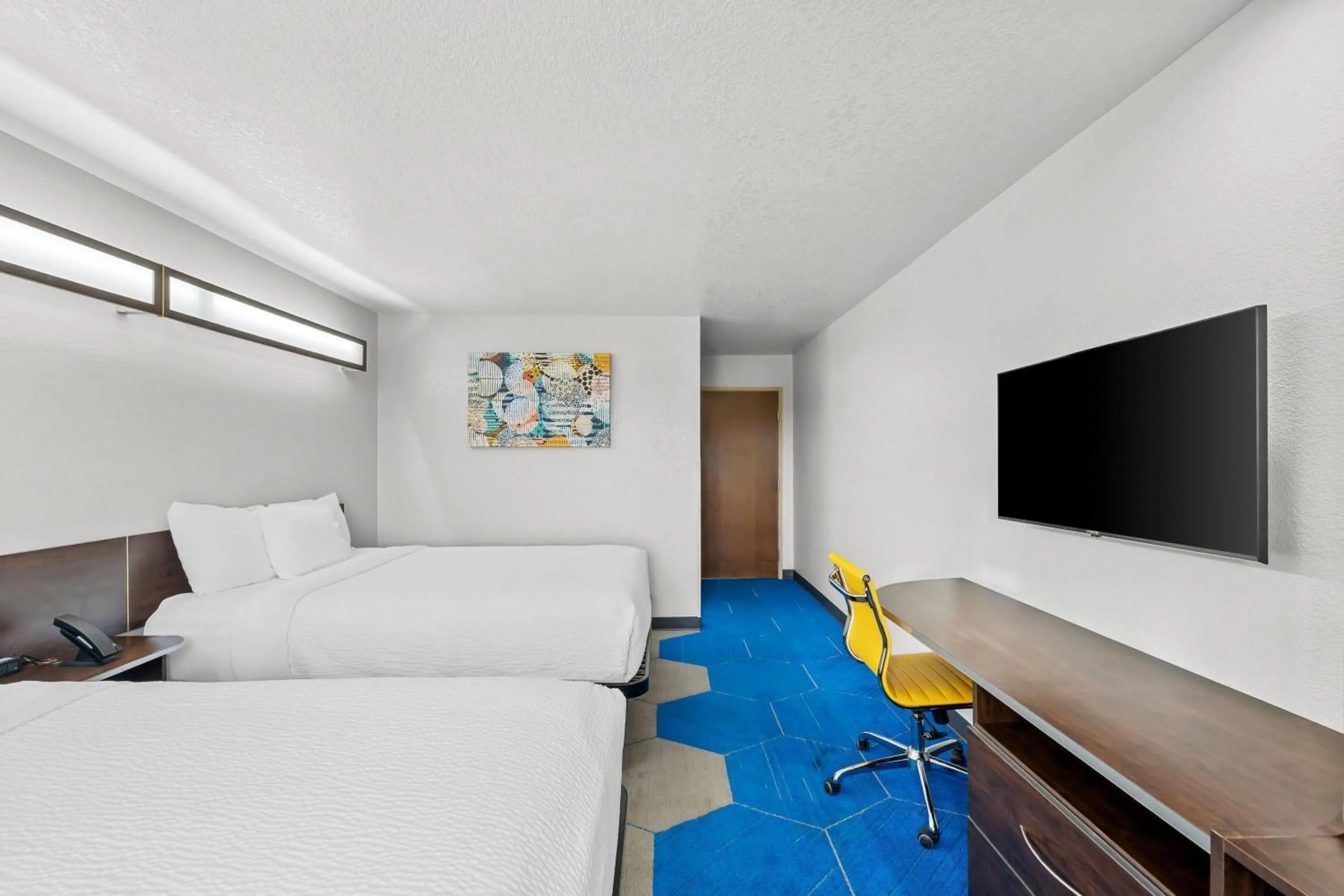 Bed in Microtel Inn & Suites by Wyndham Searcy