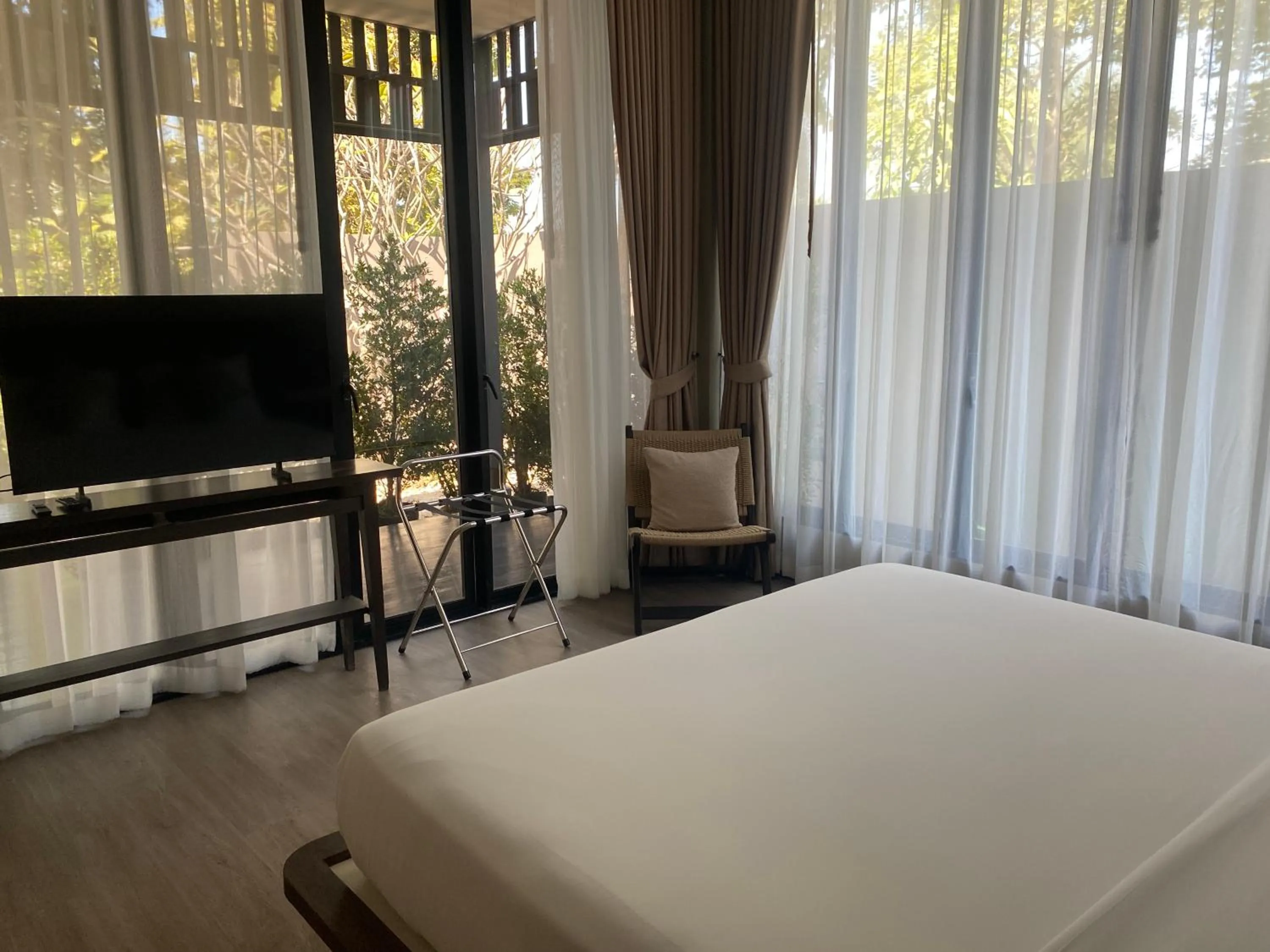 Bed in Triple Tree Beach Resort