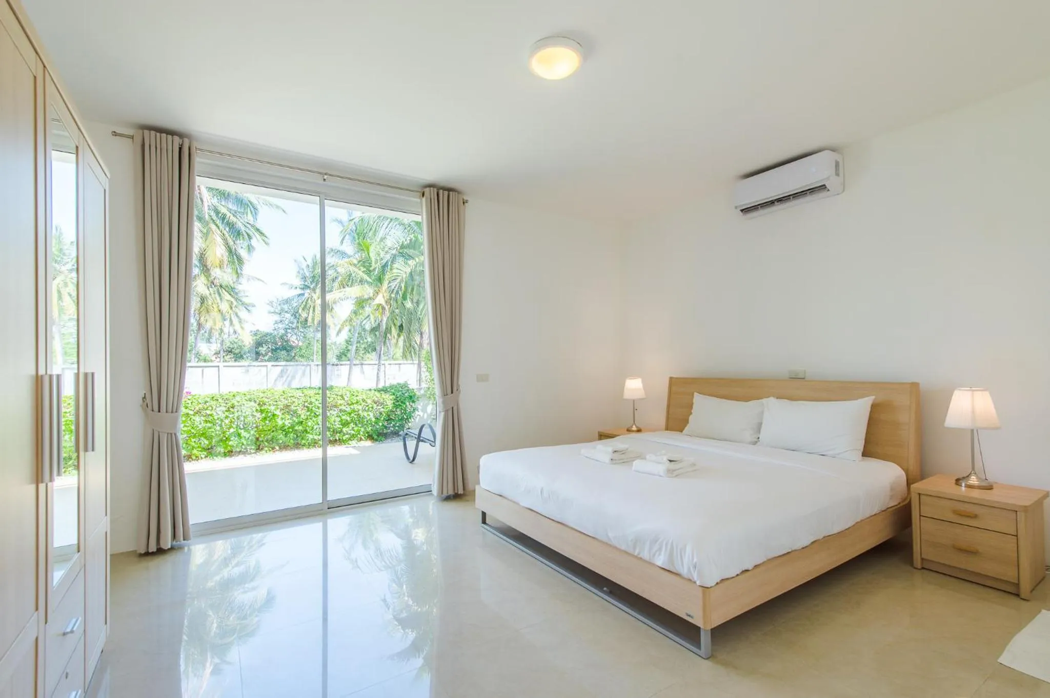 Bed in The Beach Village Resort