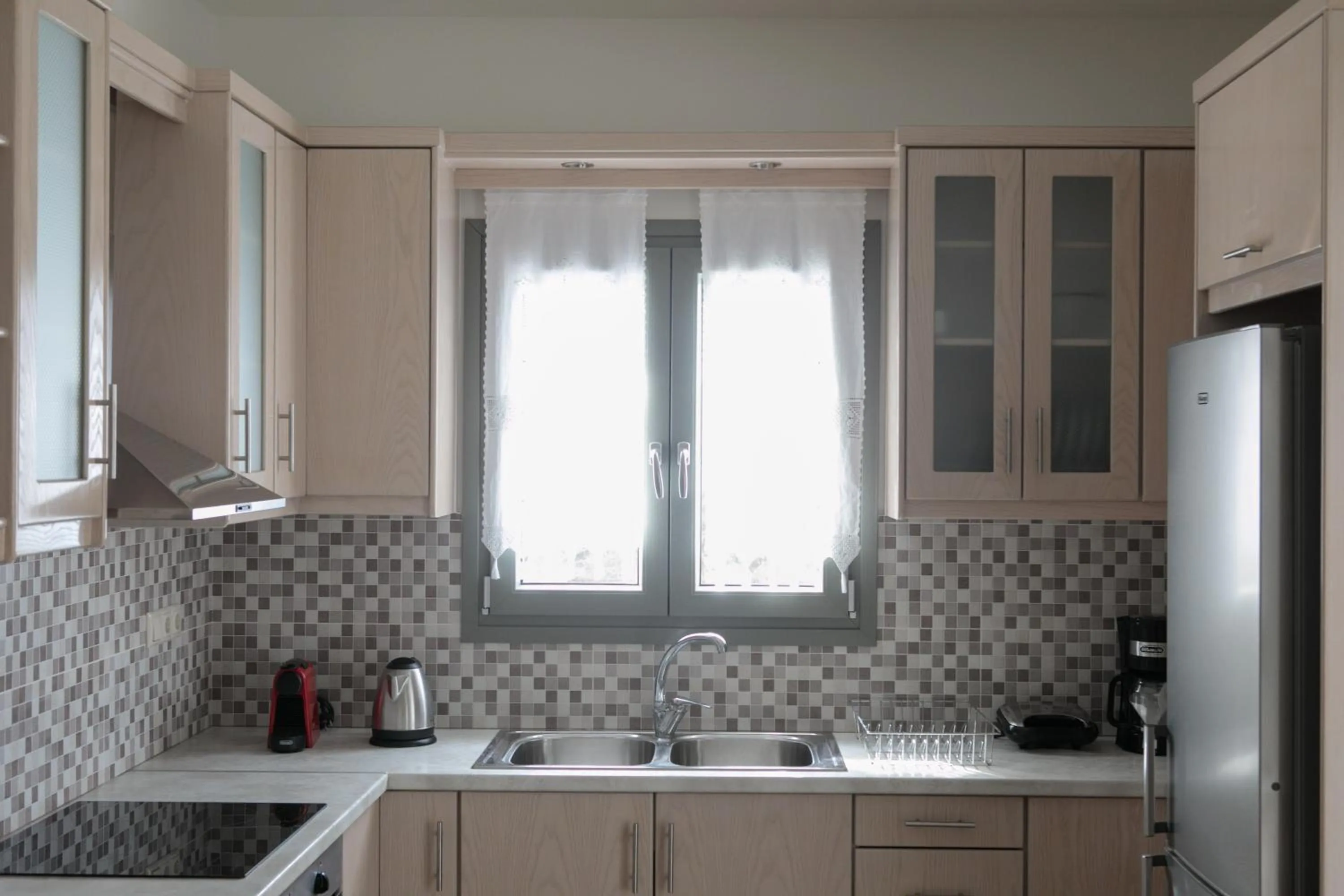 Kitchen or kitchenette in Sweet Home Naxos