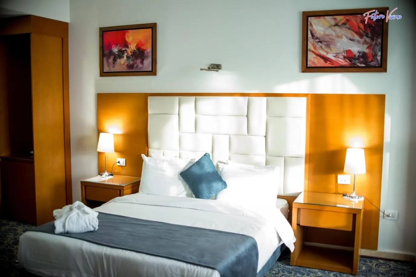 Bed in Rehana Plaza Hotel