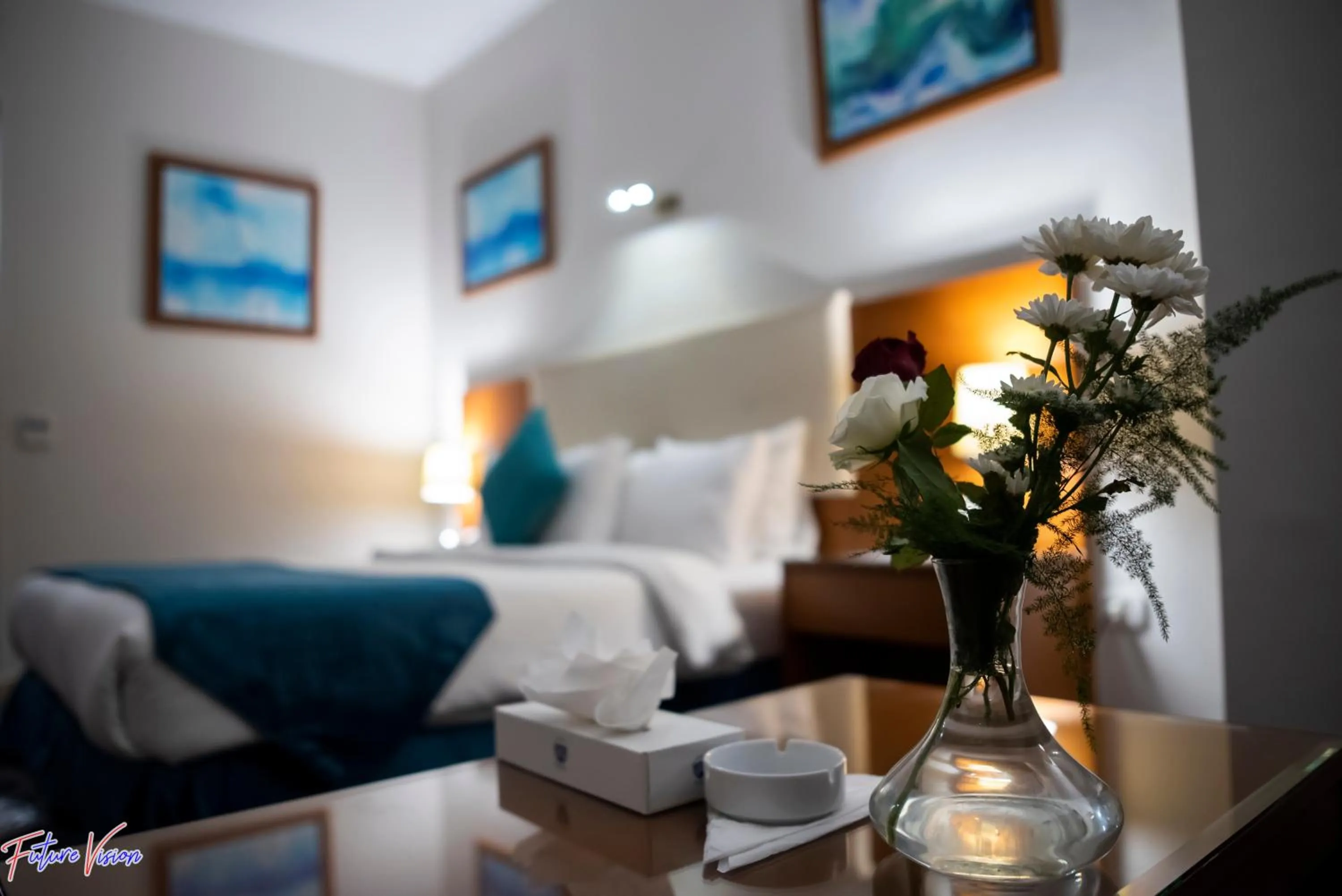 Bed in Rehana Plaza Hotel