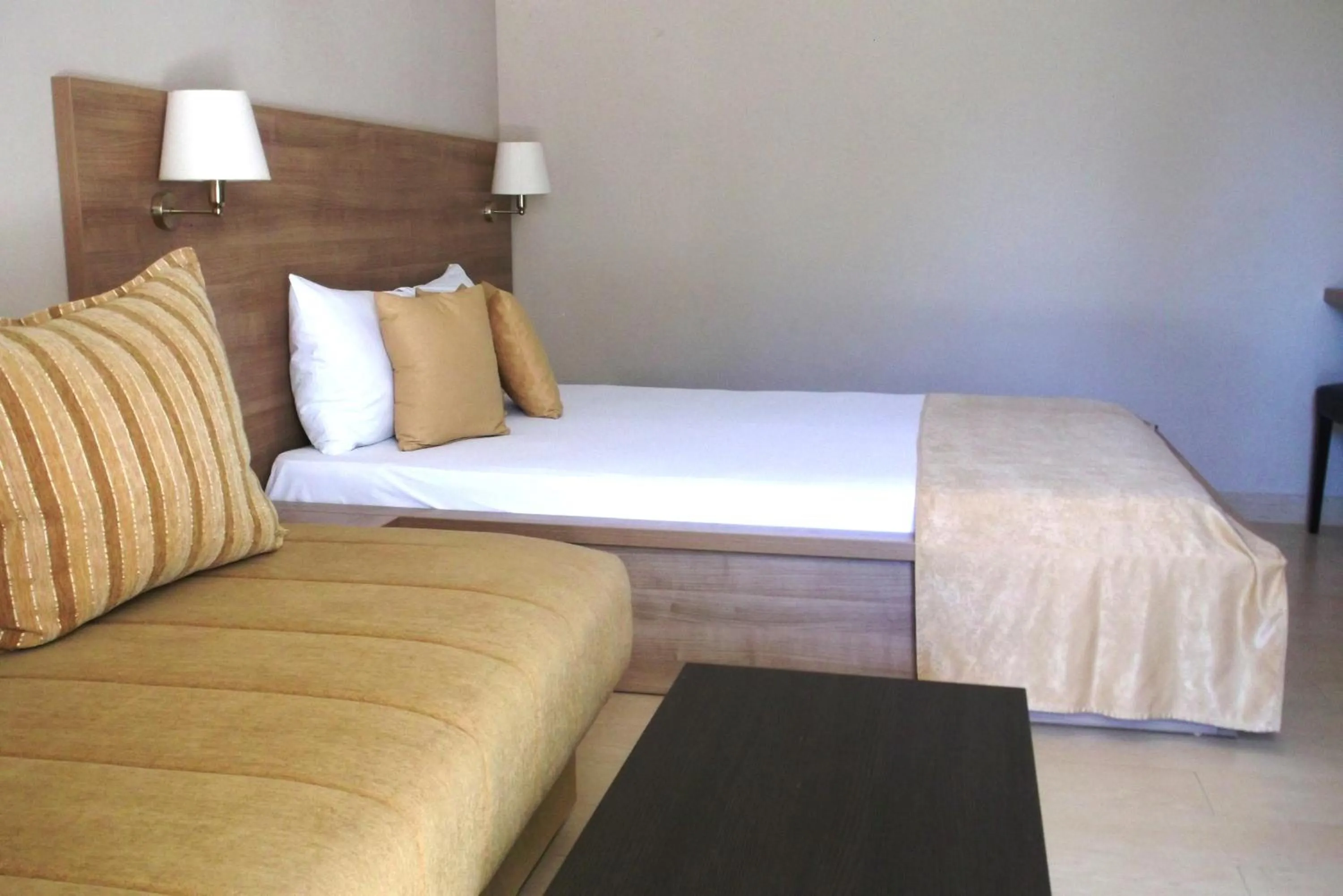 Bed in Vila V Lux Apartments