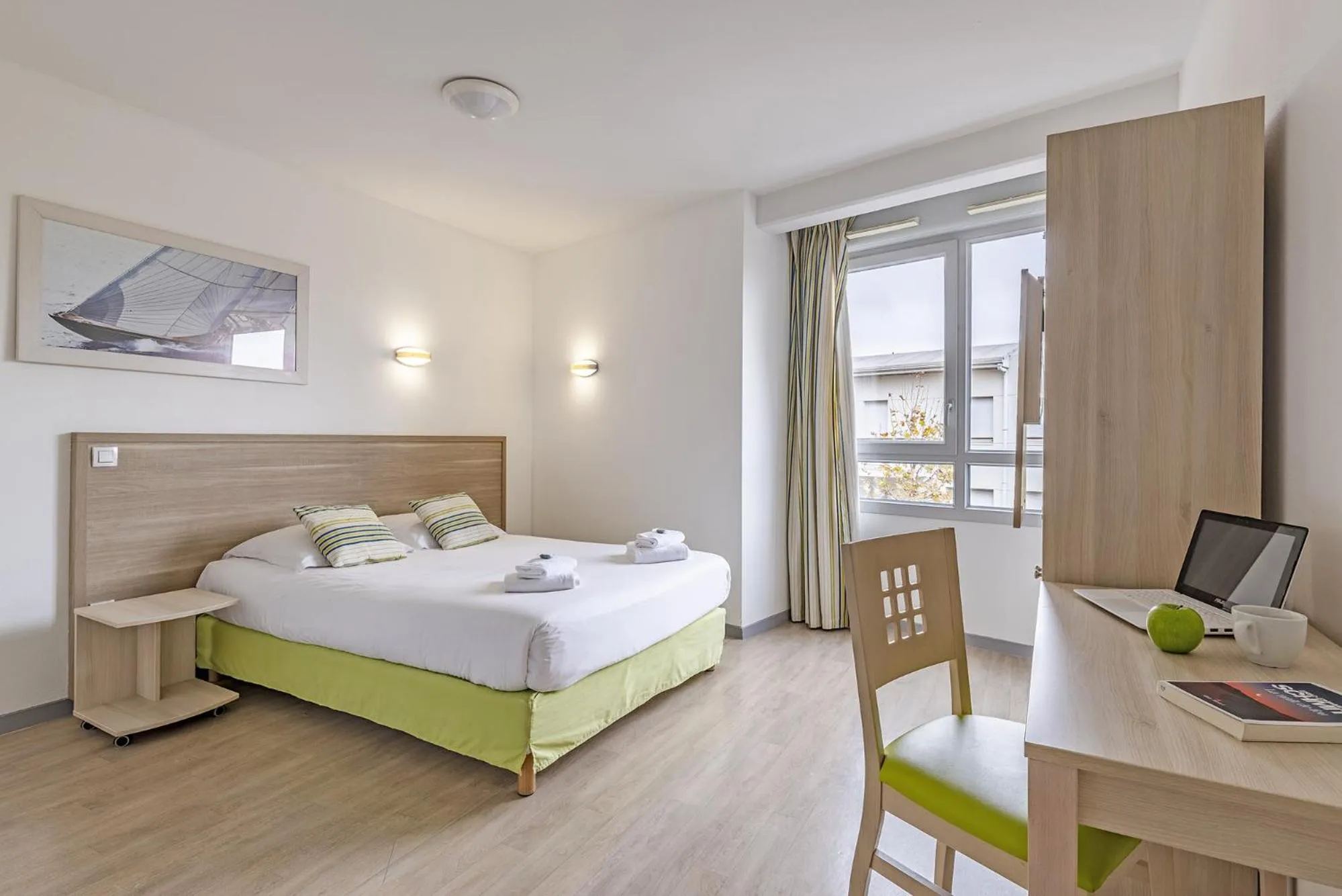 Photo of the whole room, Bed in Lagrange Apart'Hotel l’Escale Marine