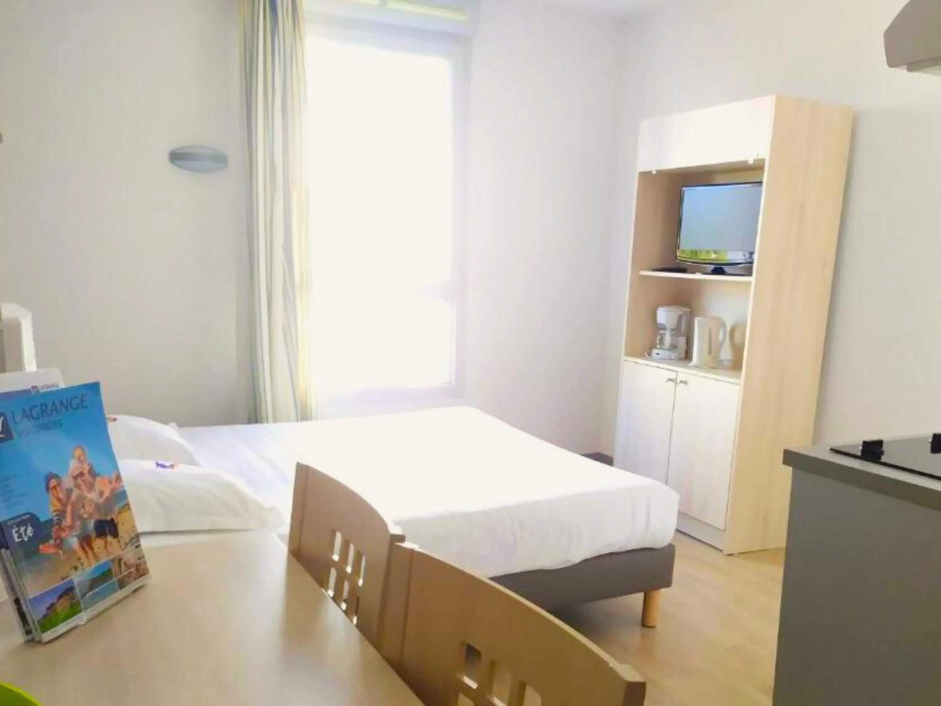 Bedroom, Bed in Lagrange Apart'Hotel l’Escale Marine