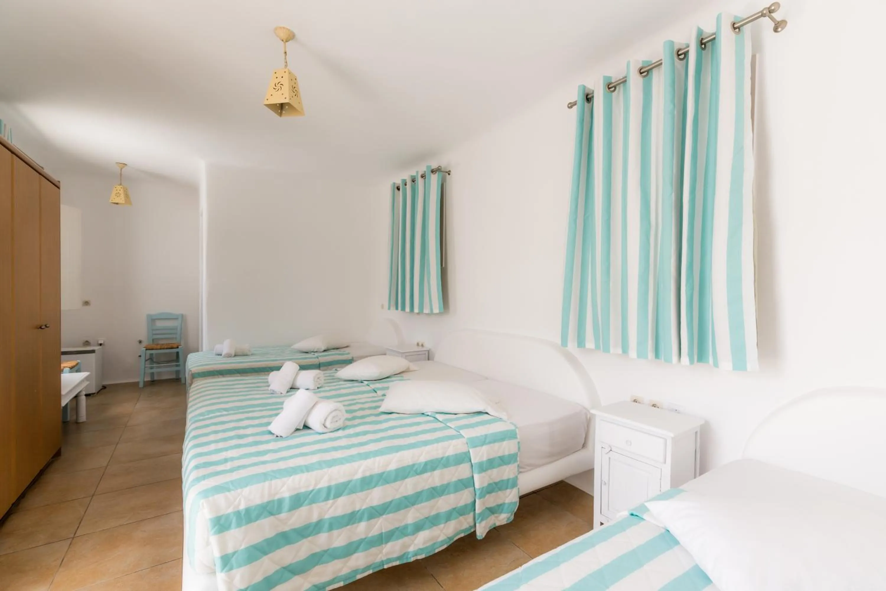 Photo of the whole room, Bed in Paradise Beach Resort