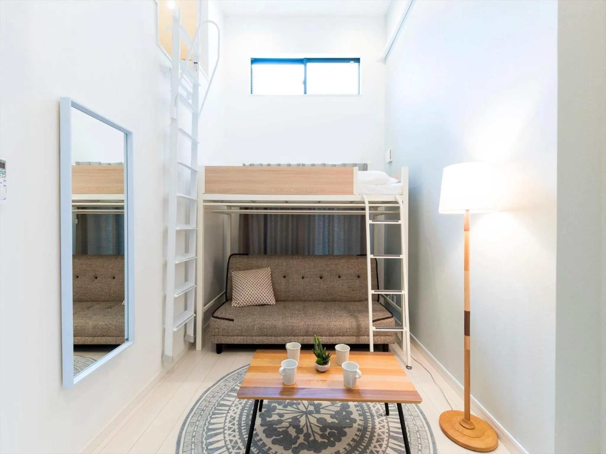 Living room, Bed in TRIP POD TAKASAGO A