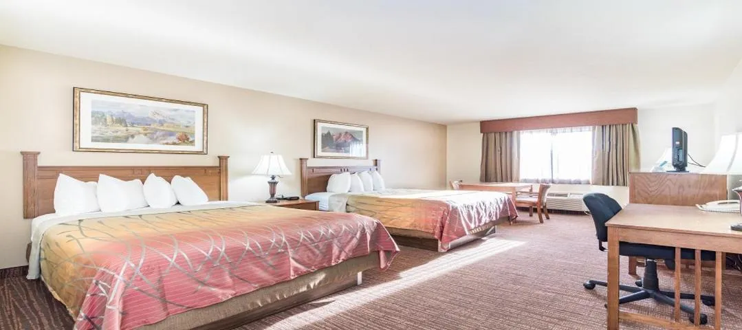 Bed in Teton West Motel