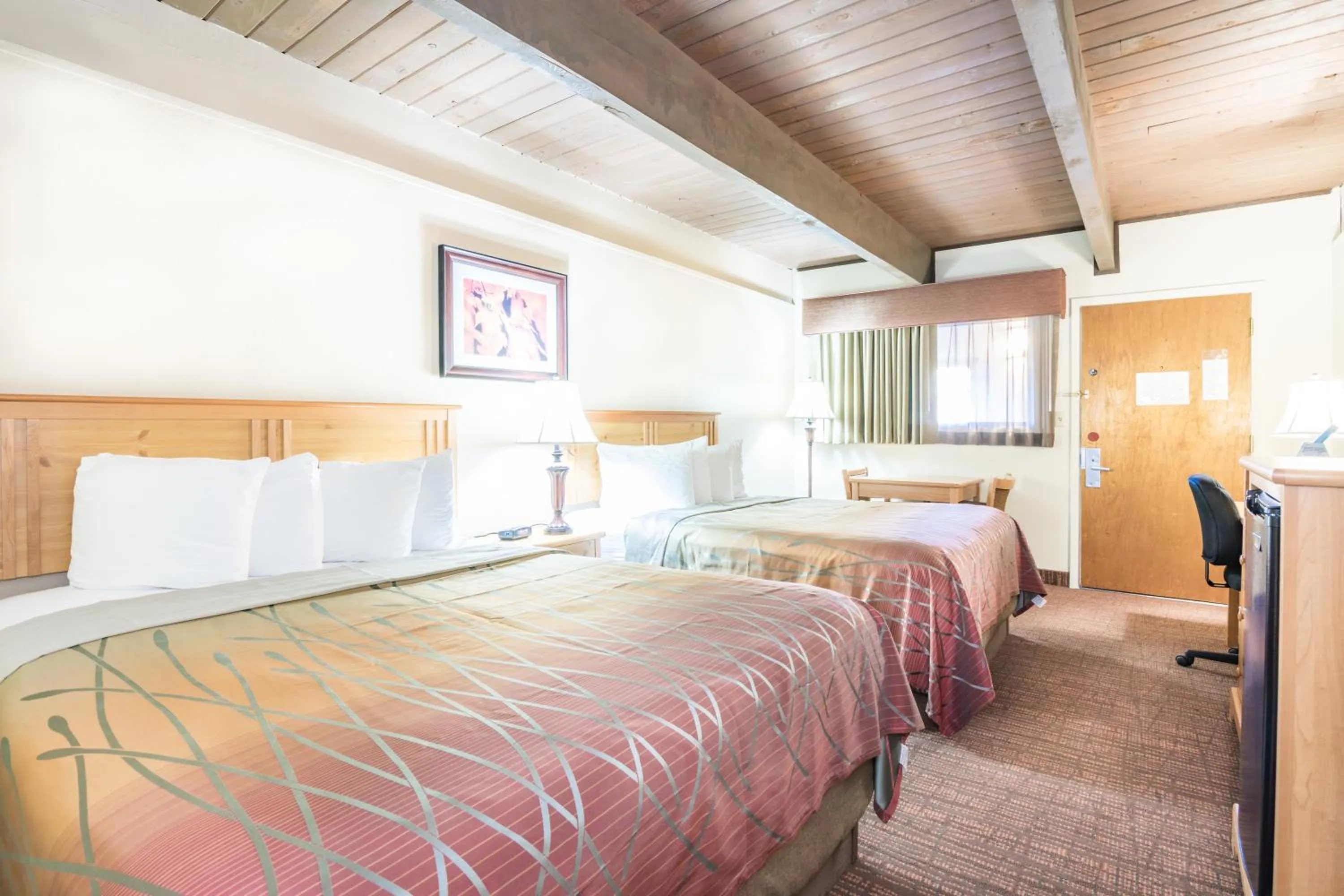 Bed in Teton West Motel