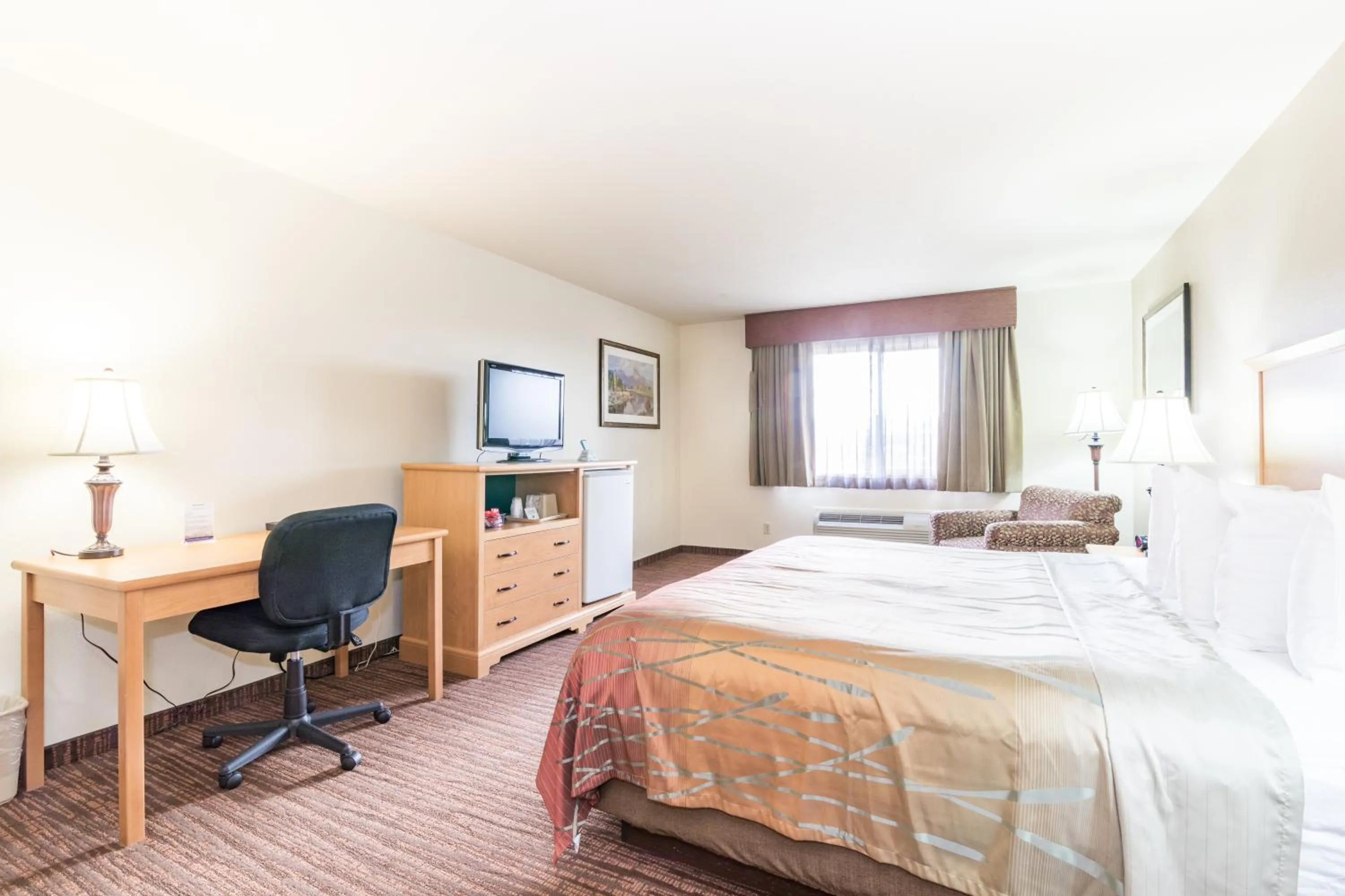 Bed in Teton West Motel