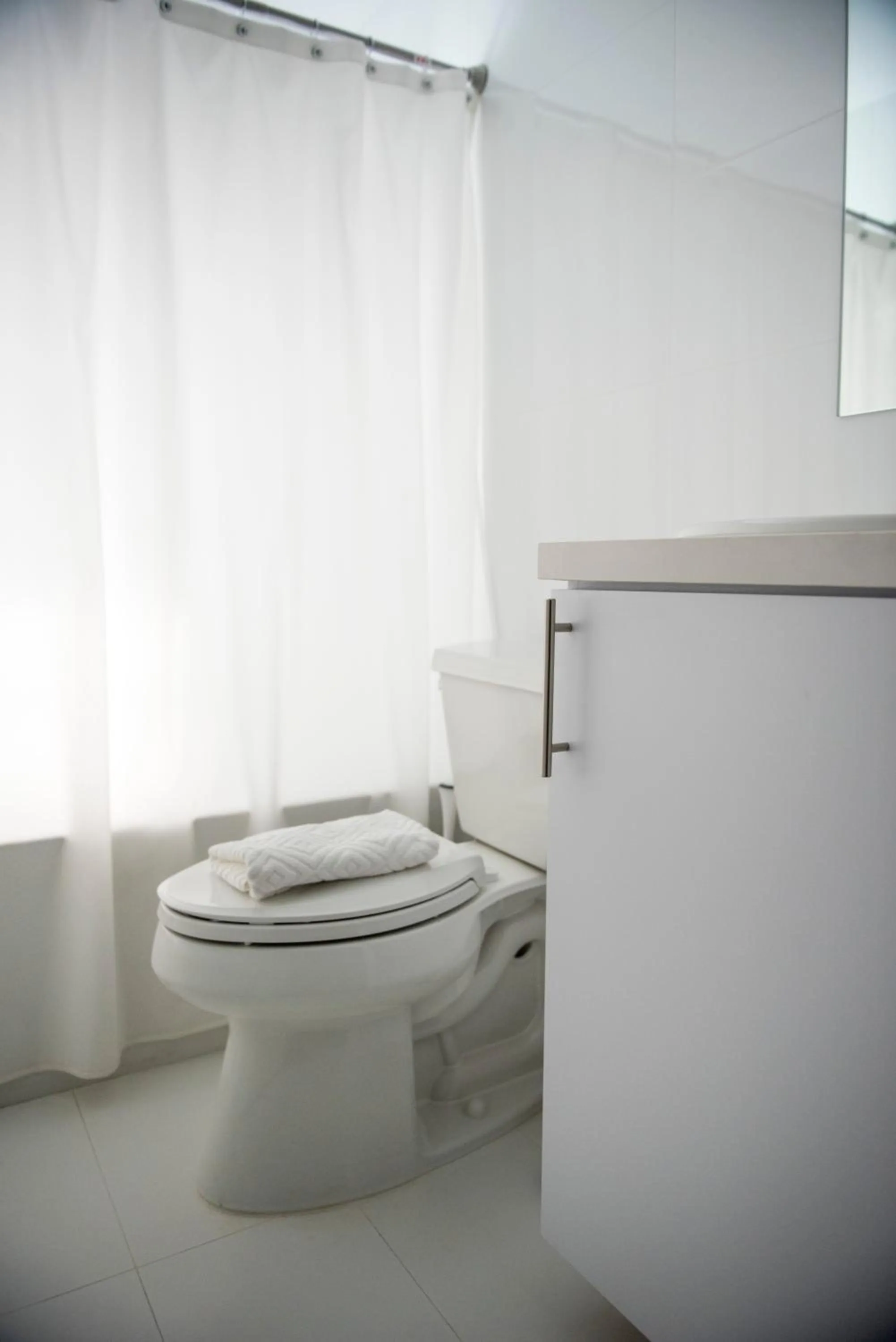 Bathroom in 12th & Ocean Suites by LuxUrban