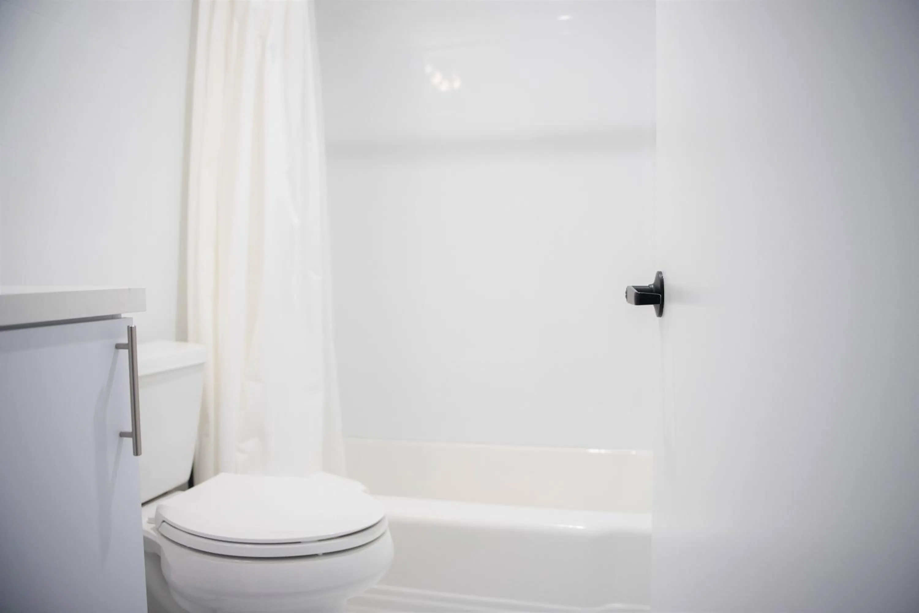 Bathroom in 12th & Ocean Suites by LuxUrban