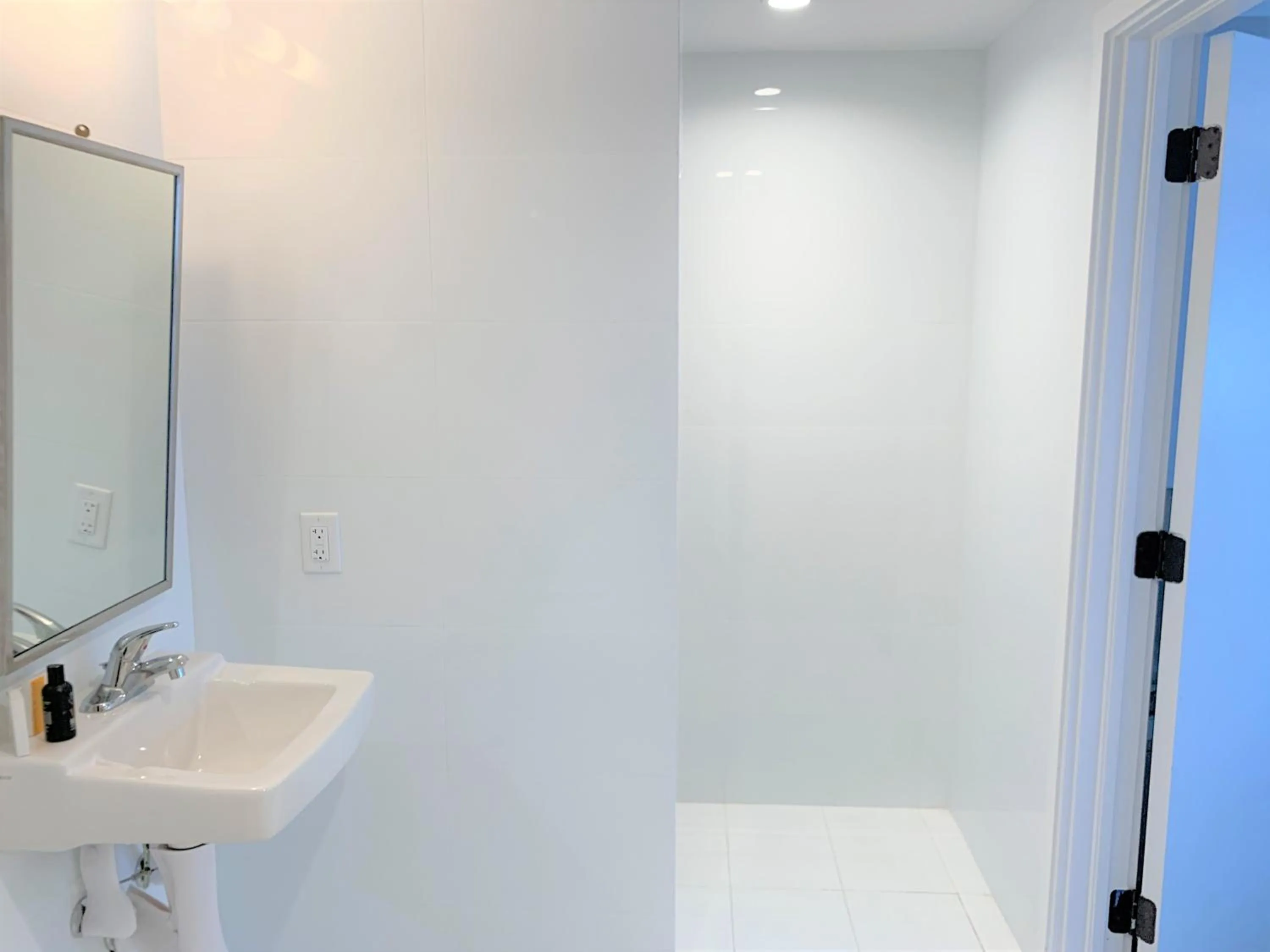 Bathroom in 12th & Ocean Suites by LuxUrban