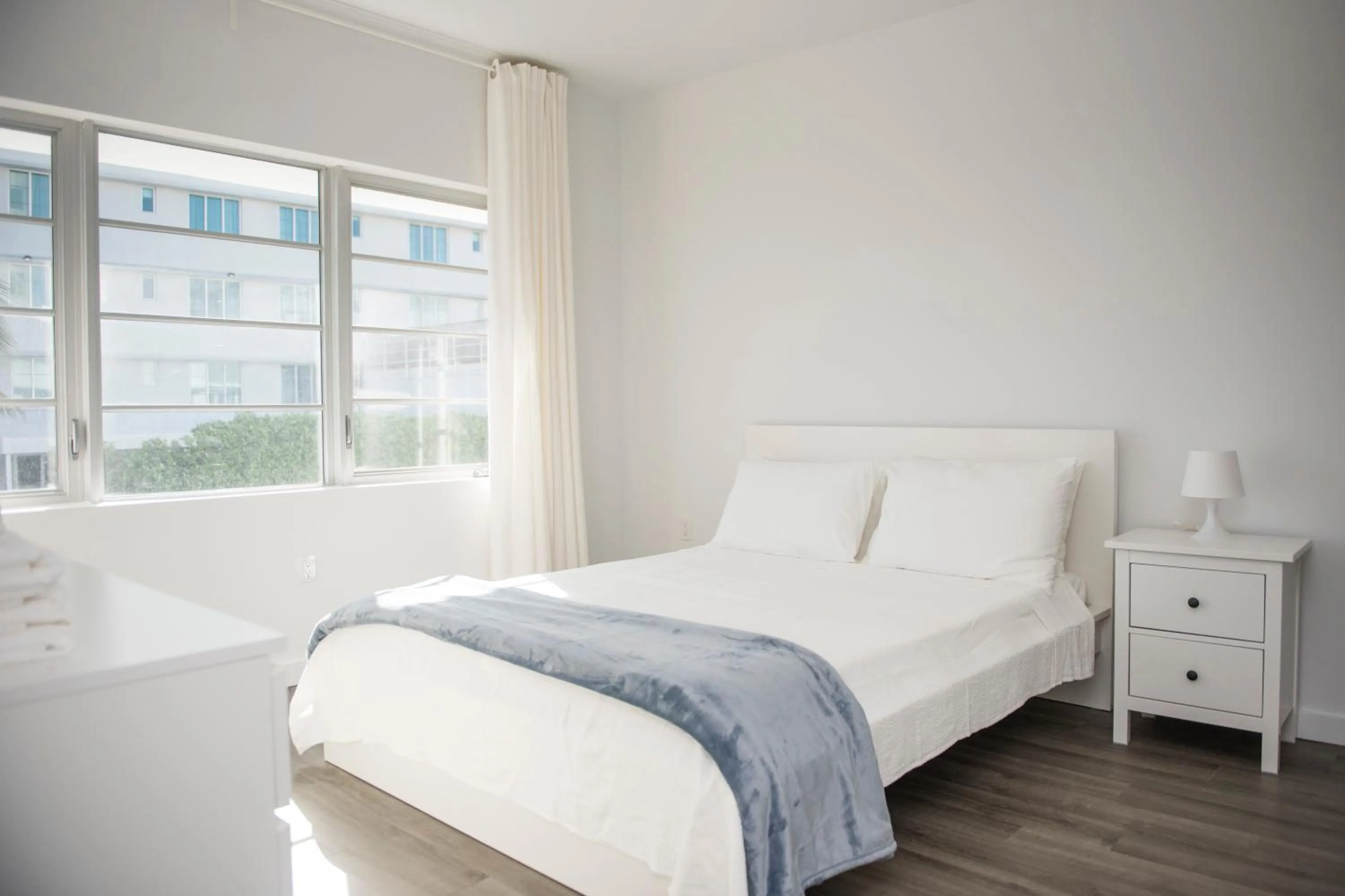 Bedroom in 12th & Ocean Suites by LuxUrban