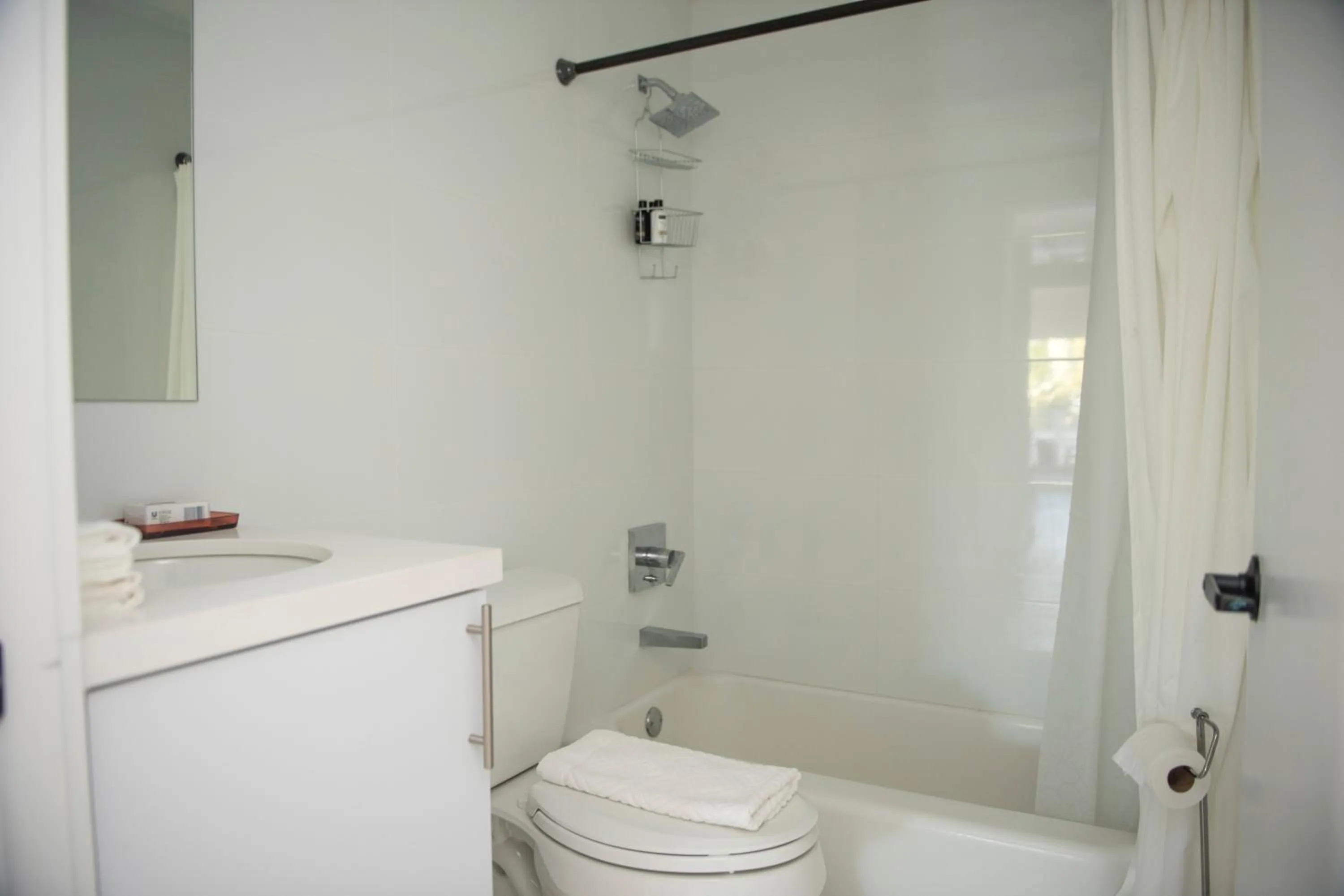 Bathroom in 12th & Ocean Suites by LuxUrban