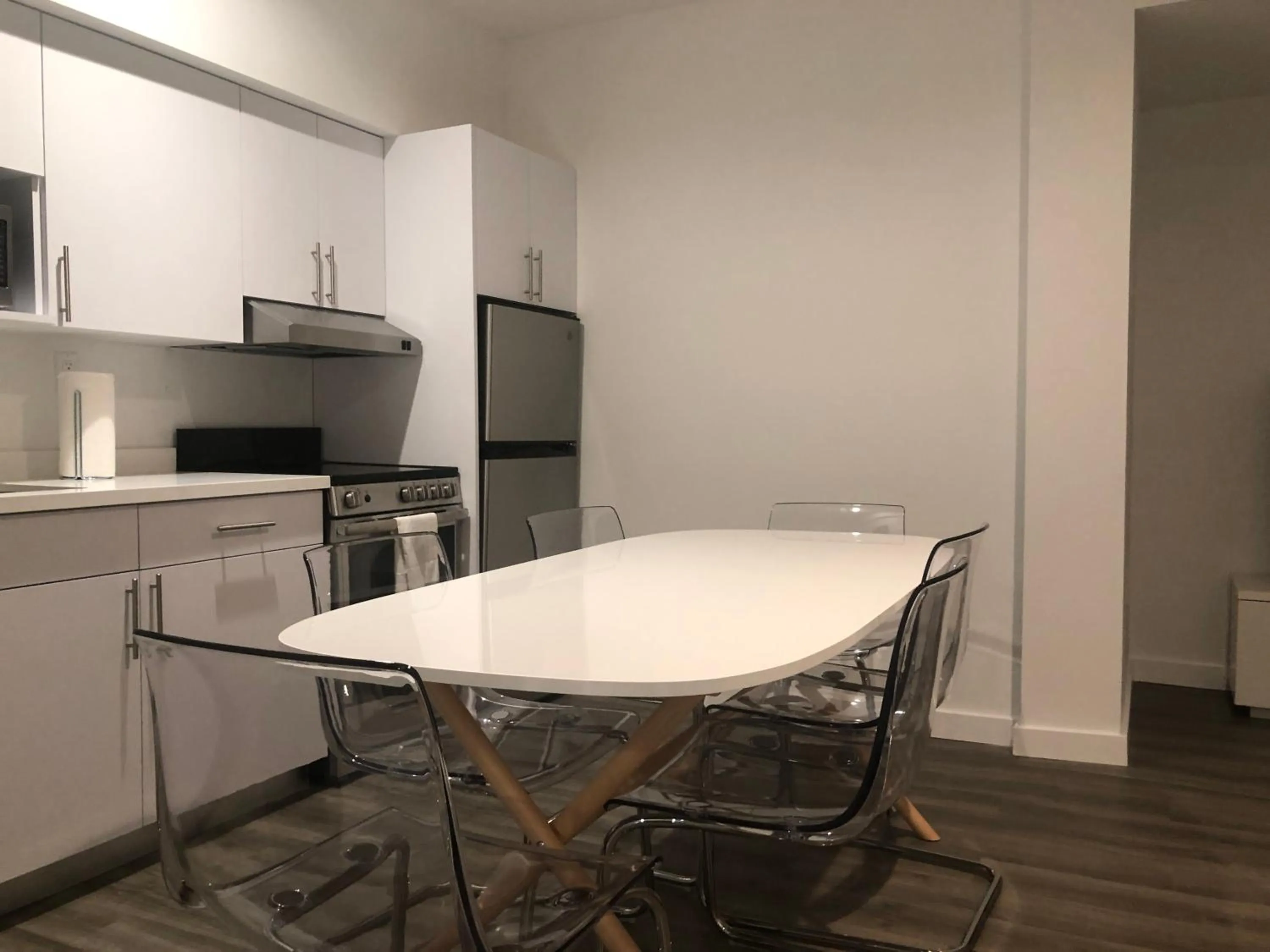 Dining Area in 12th & Ocean Suites by LuxUrban