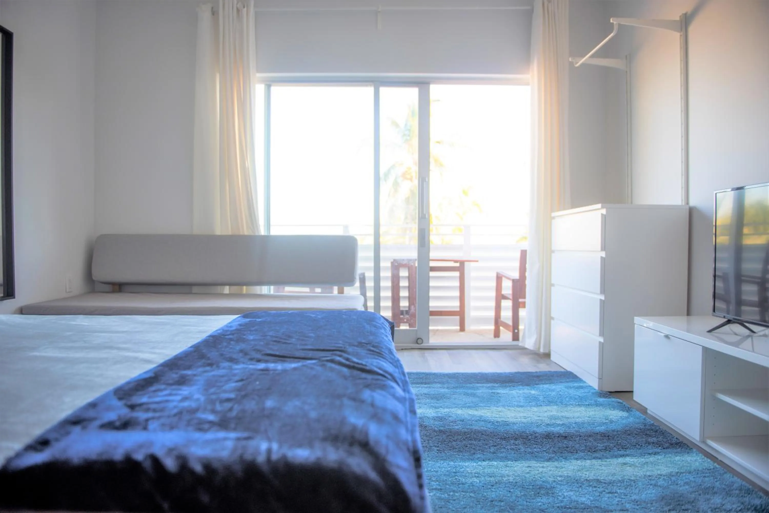 Bedroom in 12th & Ocean Suites by LuxUrban