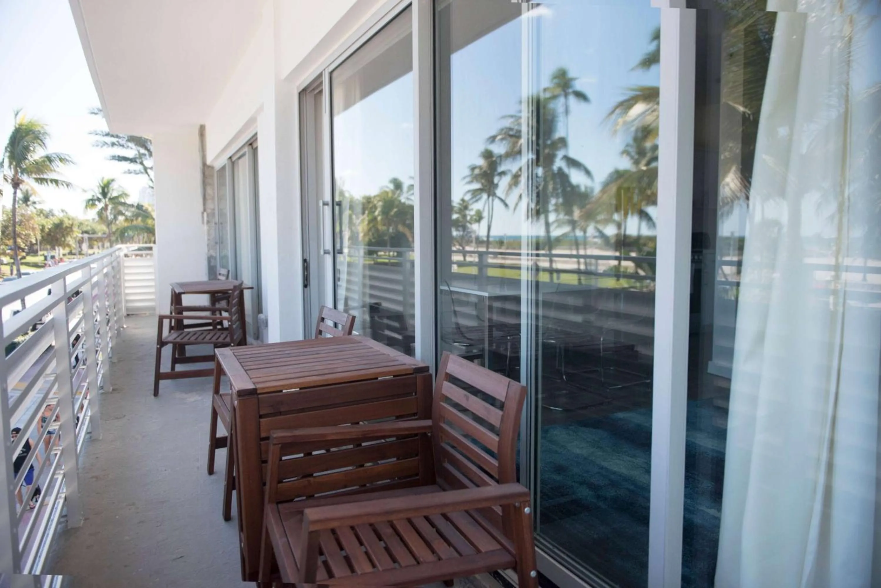 Photo of the whole room, Balcony/Terrace in 12th & Ocean Suites by LuxUrban
