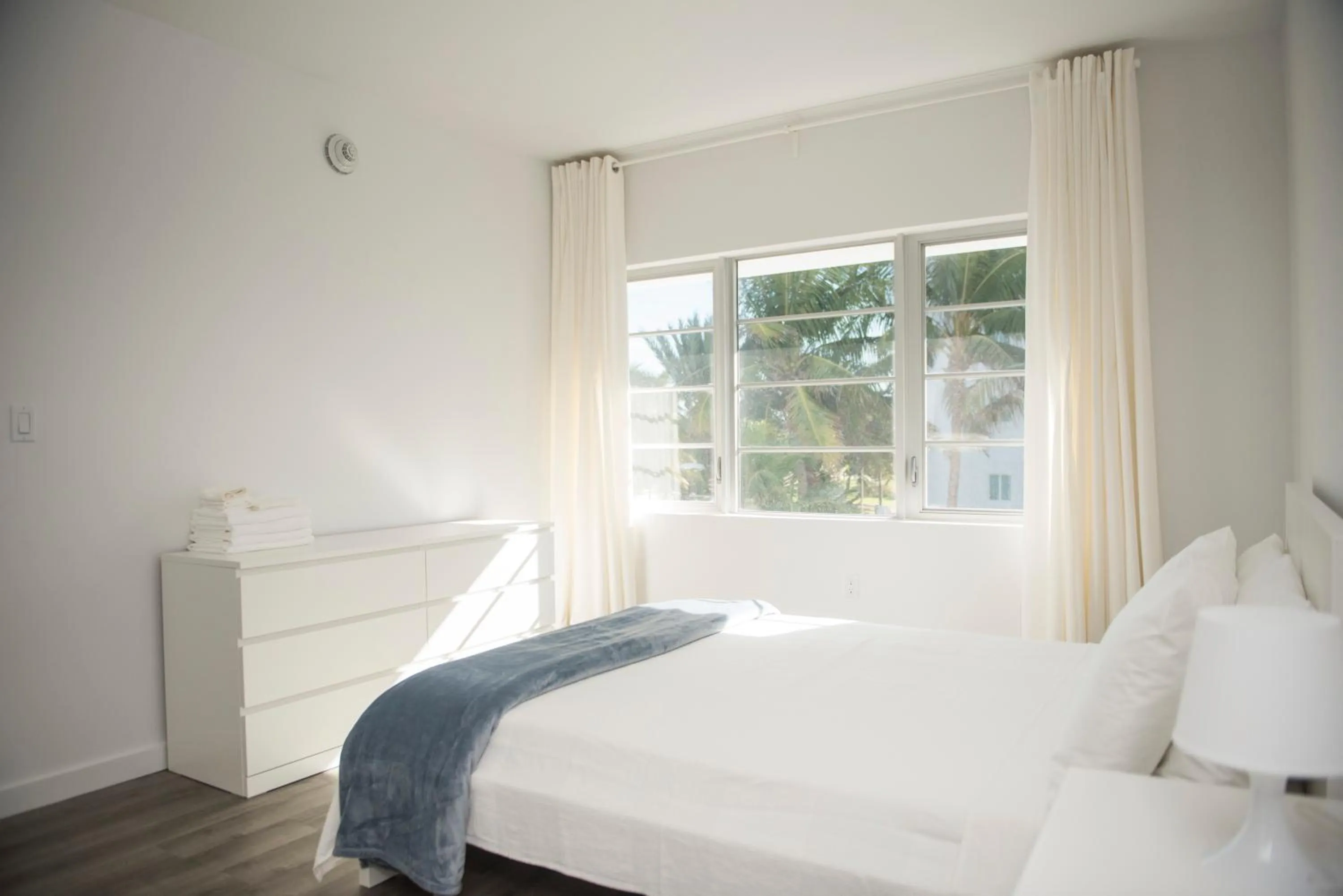 Bedroom in 12th & Ocean Suites by LuxUrban