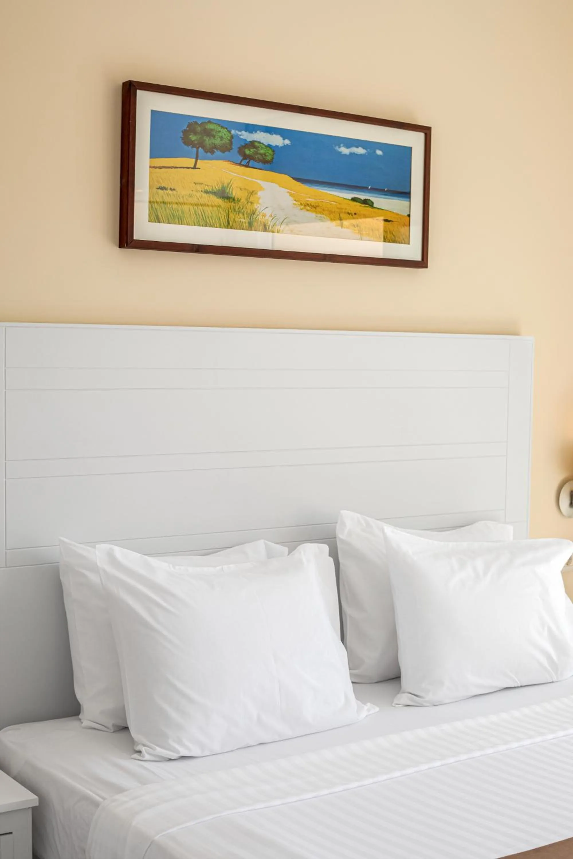 Bed in Sky View Suites Hotel