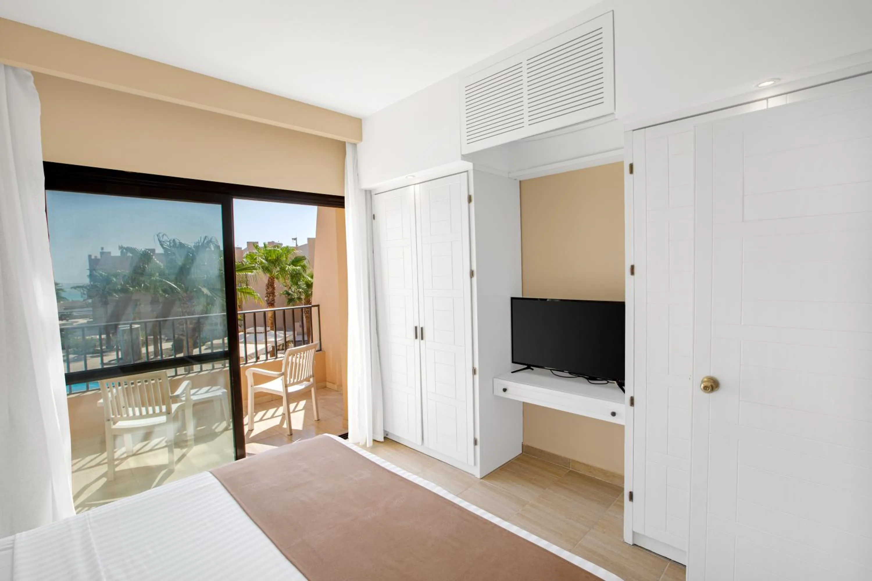 Bedroom in Sky View Suites Hotel