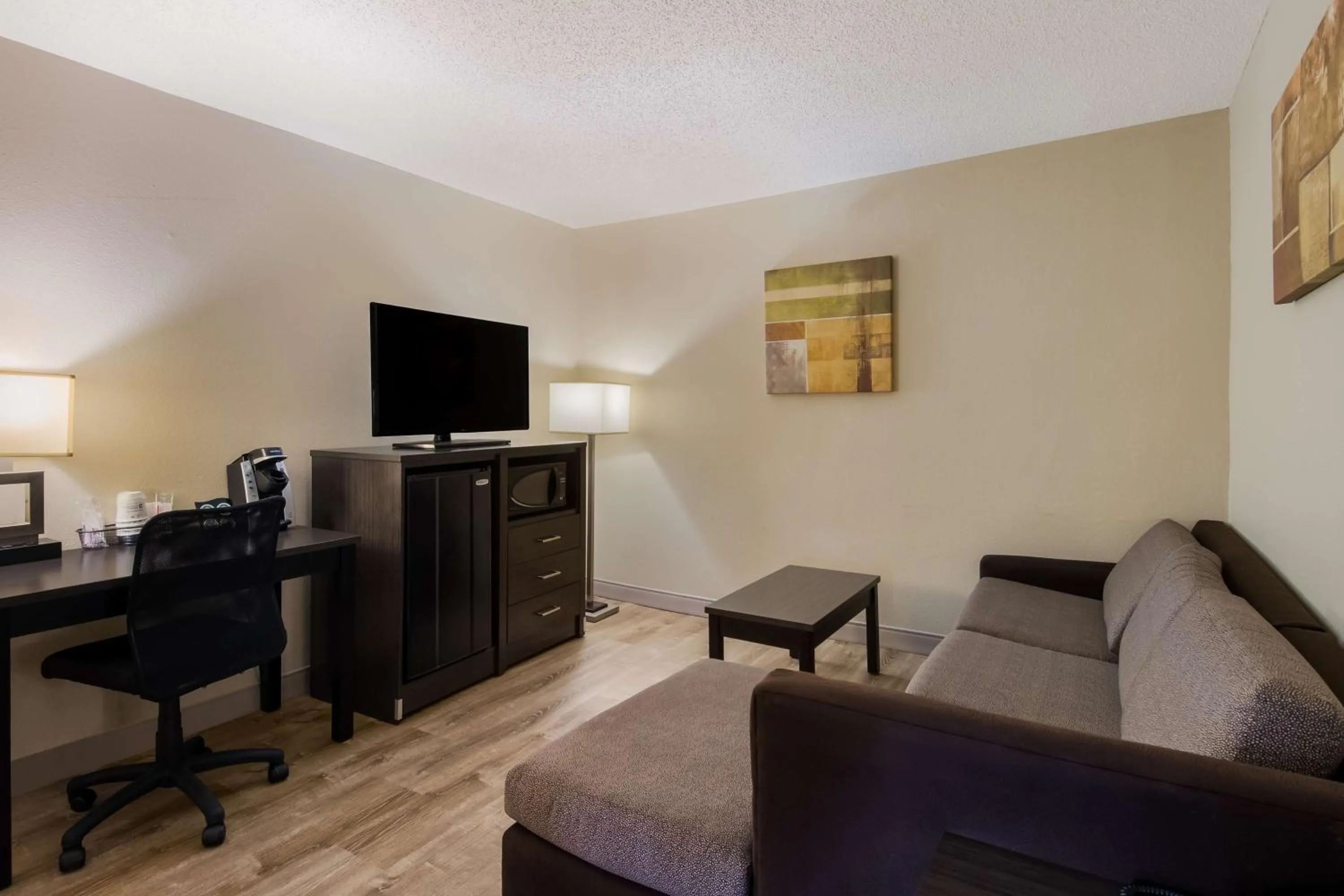 Bedroom in SureStay Plus Hotel by Best Western Jackson