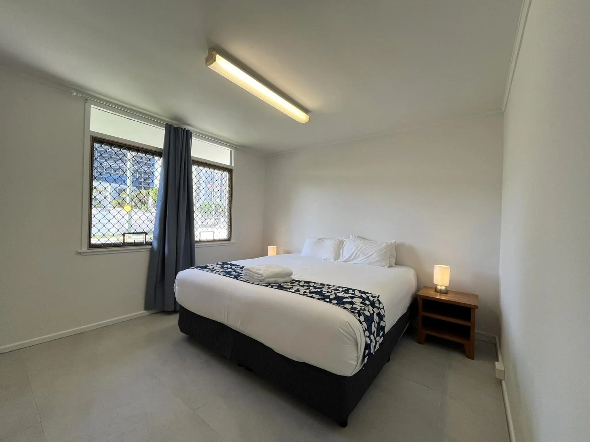 Bed in Tropicana Motel