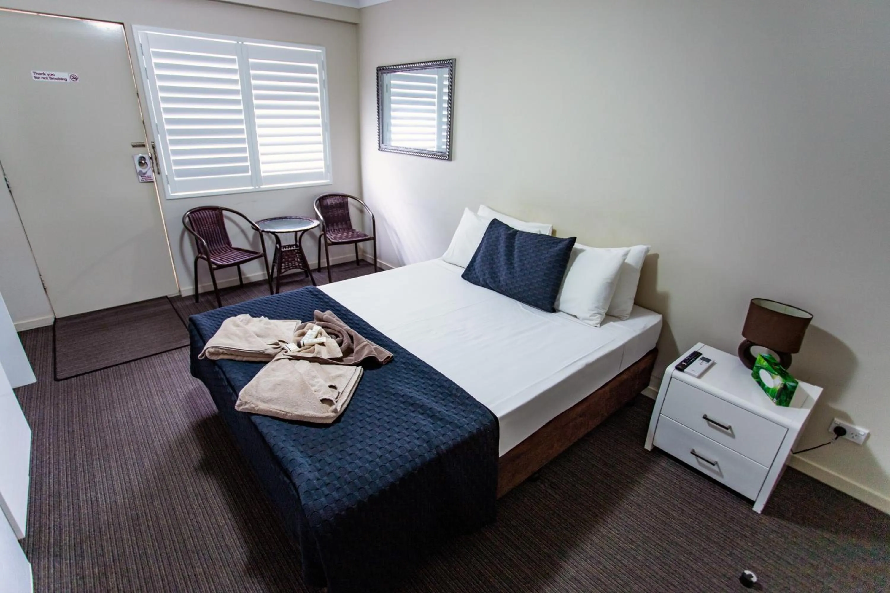 Bed in Tropicana Motel