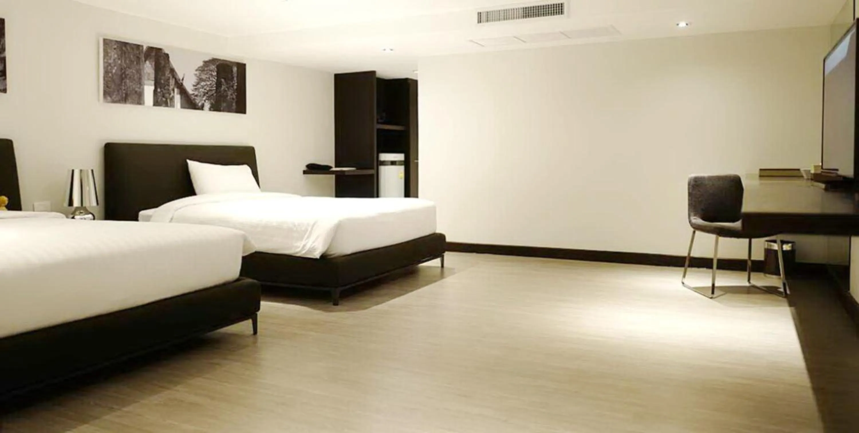 Bed in S33 Compact Sukhumvit Hotel