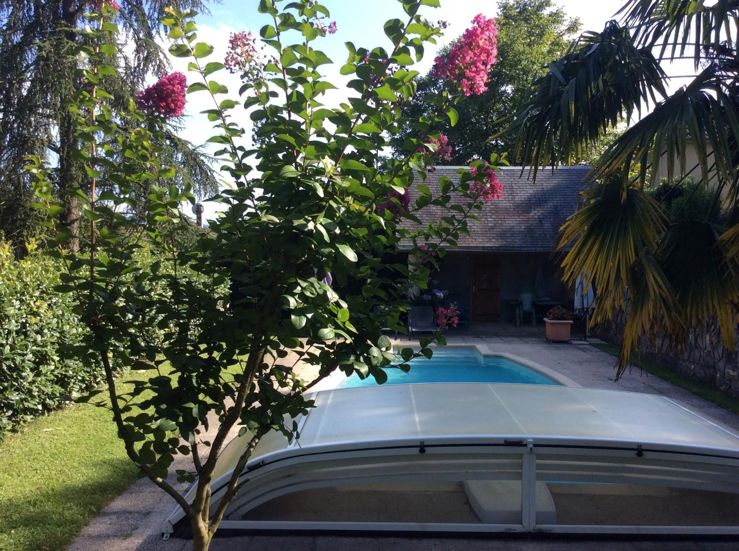 Swimming pool in Demeure d'hôtes Les Irisynes