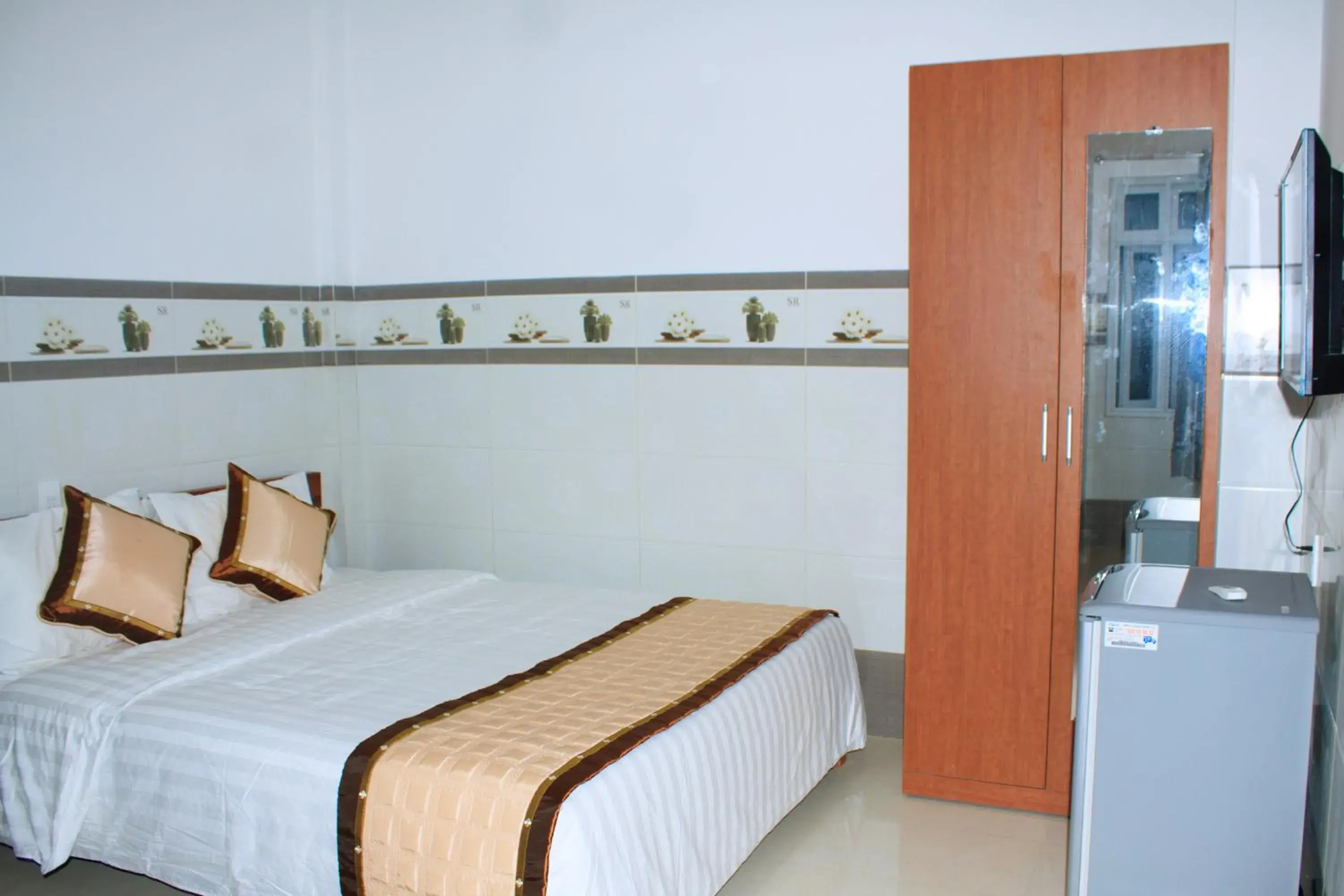 Deluxe Double Room (2 Adults + 1 Child) in Mai Tra Hotel Deluxe Double Room (2 Adults + 1 Child) in Mai Tra Hotel