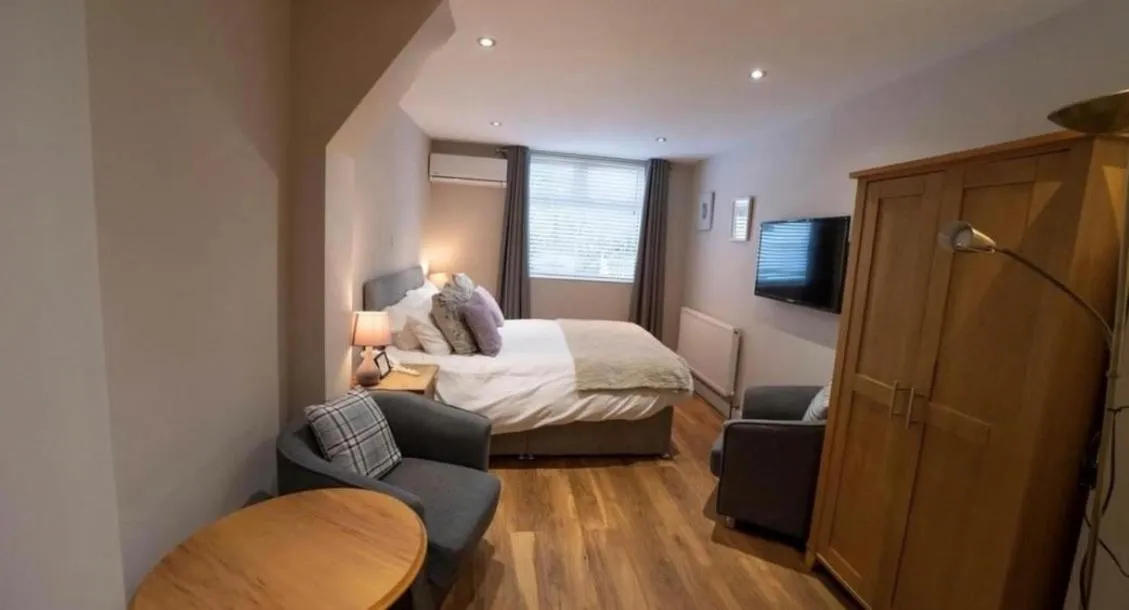 Bed in The Manor Hotel