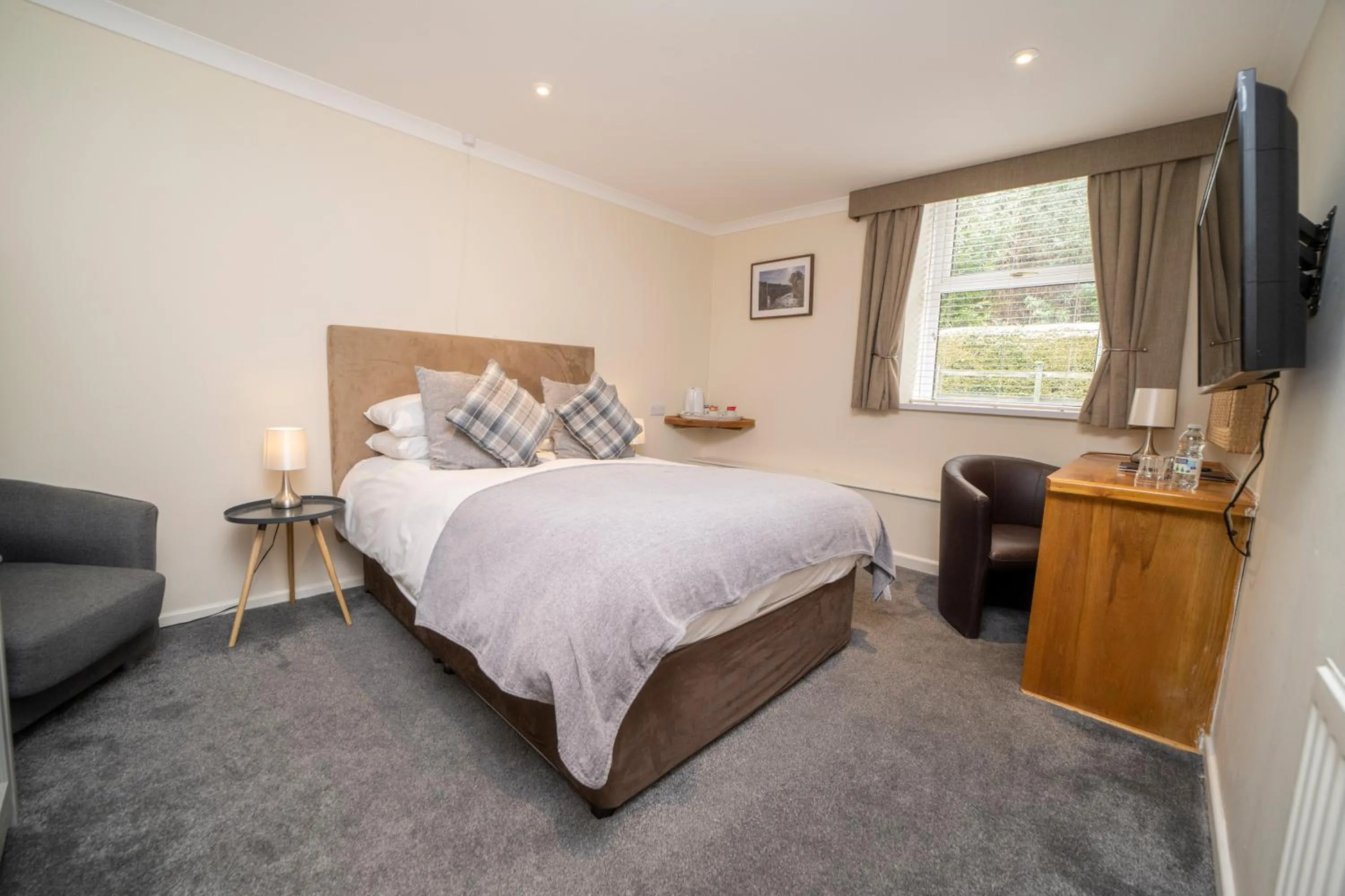 Bed in The Manor Hotel