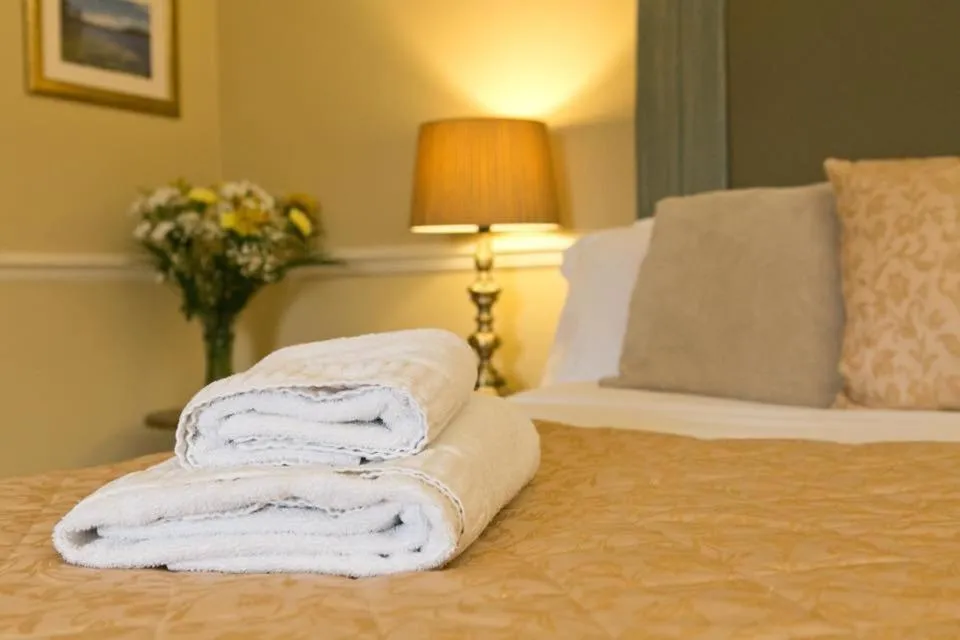 Bed in The Manor Hotel