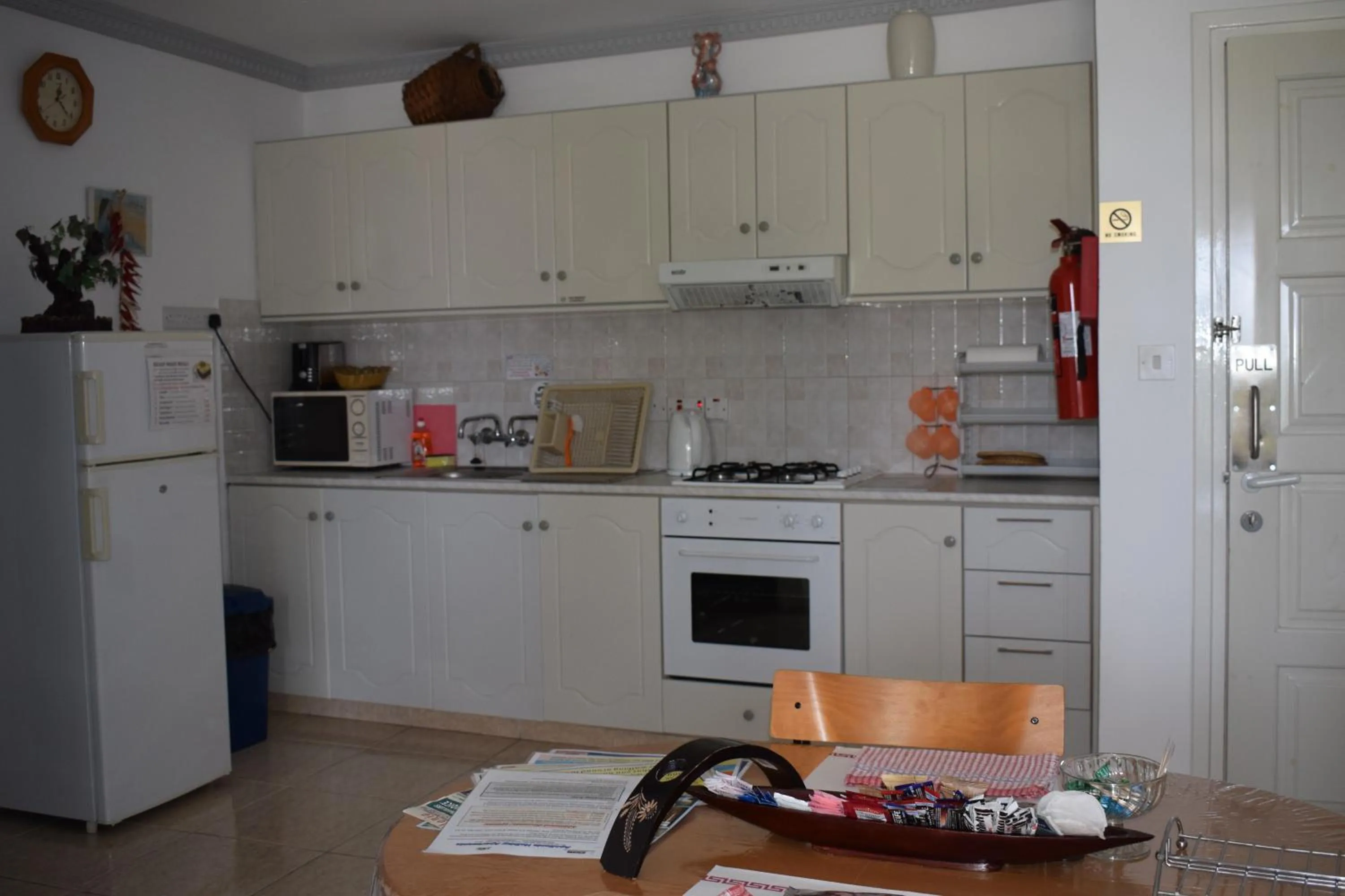Kitchen or kitchenette in Apollonia Hotel Apartments
