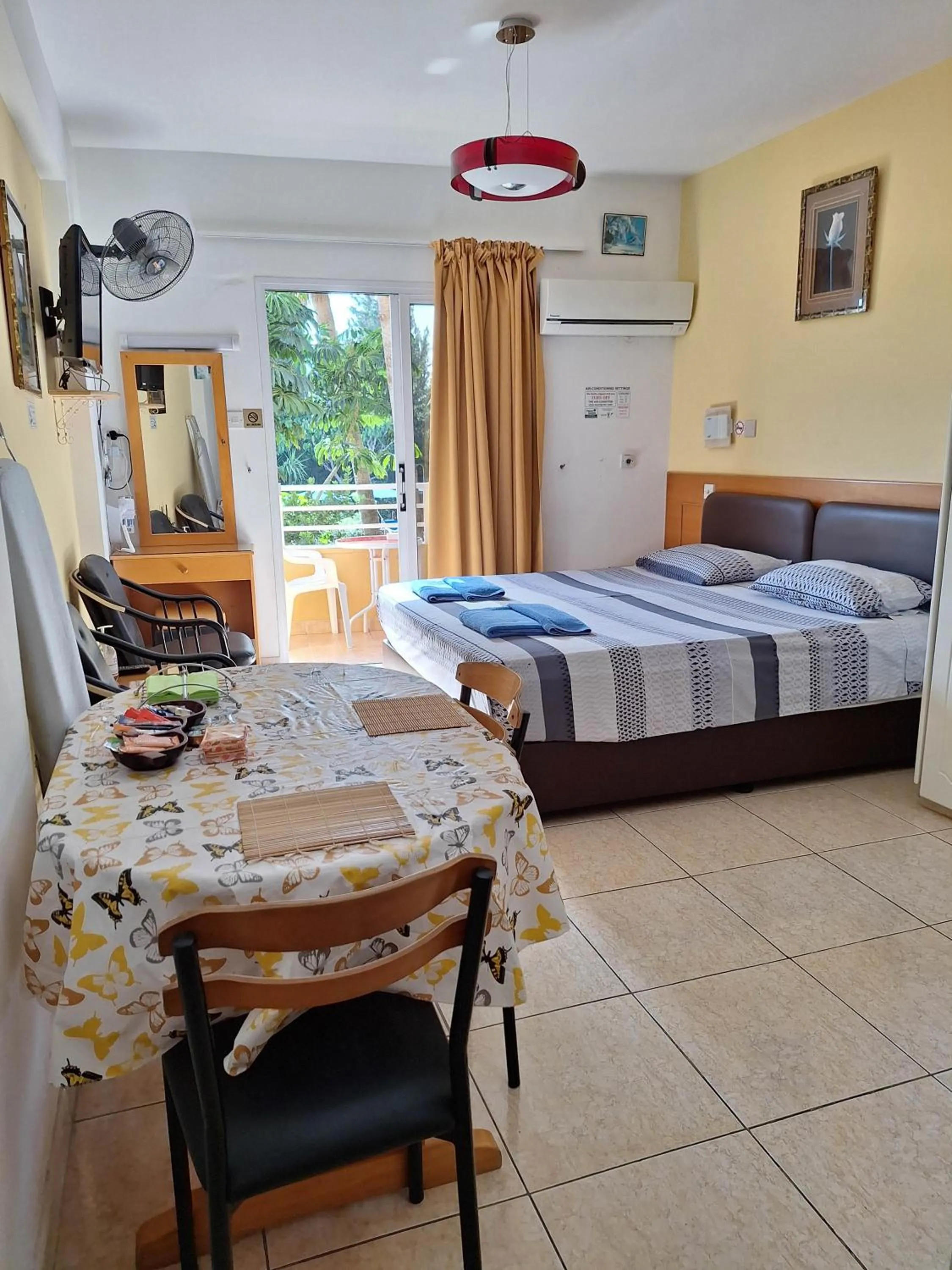 Bed in Apollonia Hotel Apartments