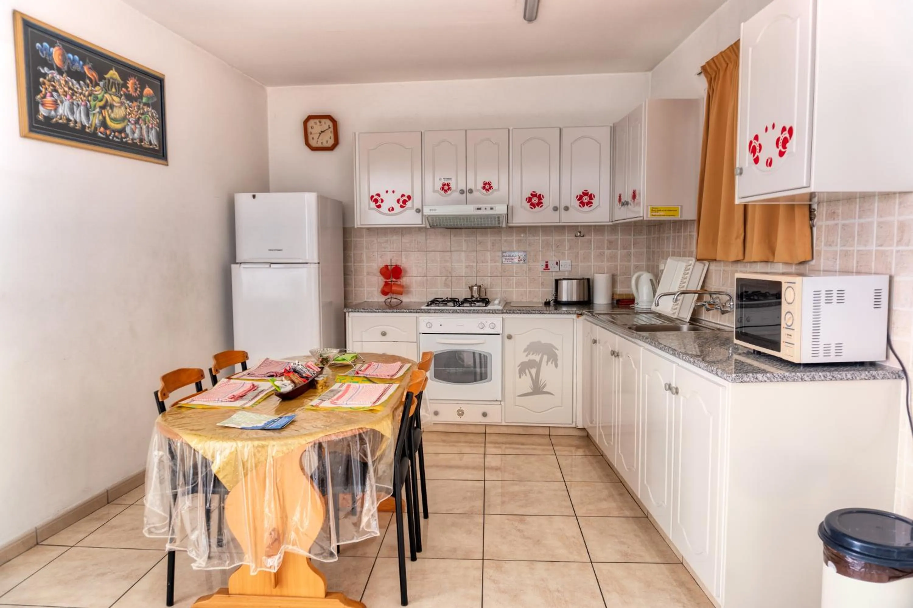 Kitchen or kitchenette in Apollonia Hotel Apartments